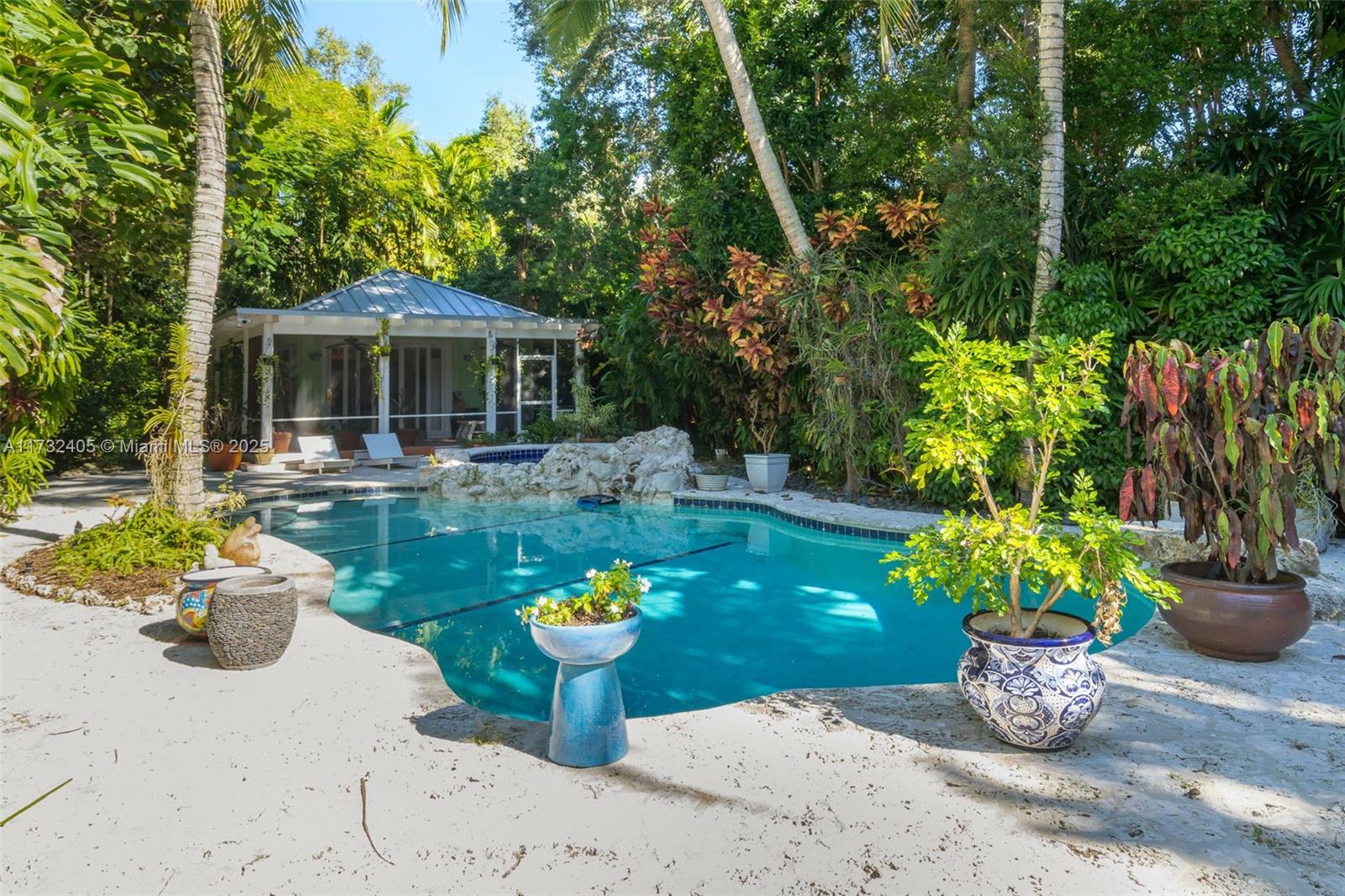 Get your offers in!! One-of-a-Kind Coconut Grove Oasis on a massive 16,800 SF Corner Lot
This rare estate at the iconic Four Corners in South Coconut Grove offers lush landscaping, a coral rock terrace, and a large deep pool. The main house features two primary suites, an additional bedroom, and a bath. Two separate structures include a guest house with 2 beds, 2 baths, a kitchen, and laundry, plus a cozy Casita with 1 bed, 1 bath, and a screened patio. Upgraded with a new roof and impact windows, it’s near top-rated schools and close proximity to downtown Grove Village, Michelin dining, and Biscayne Bay. A tropical retreat with expansion and/or new development potential! A perfect retreat!