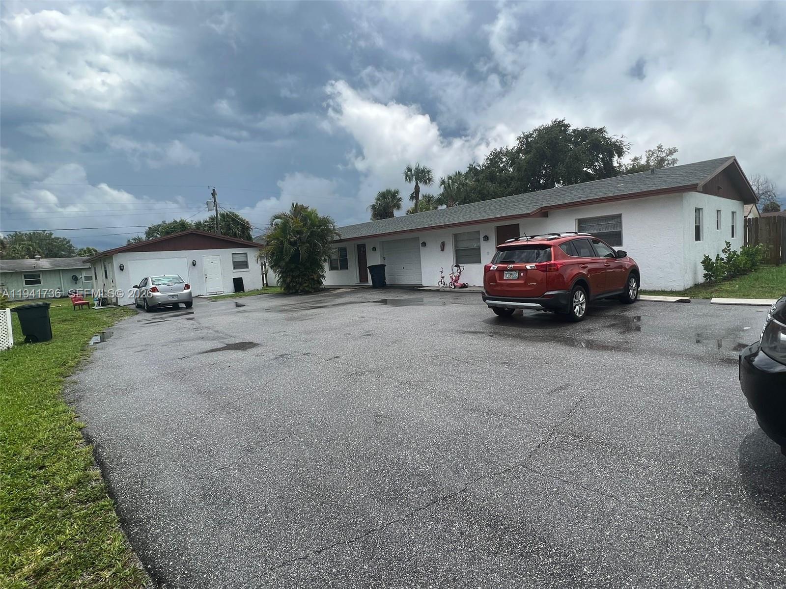 INCOME PRODUCING TRIPLEX, Unit #1: 2/1 $1,750.00 Lease ends 11/14/2026., Unit#2: 3/2 $2,300.00 Lease ends 07/19/2026., Unit #3: 2/1 $1,750.00 Lease ends 04/30/2027., Total monthly income $5,800.00, Gross annual income $69,600.00, long-term tenants, looking to stay and renew the leases, a new roof on both buildings in 2021, a new Septic Drain field in June 2020, new paint, some updating to kitchens and baths, plenty of parking, all with separate electric and water meters. Sold As Is with the right to inspect. Seller is firm on price. No showings without an accepted offer and proof of funds. Showing will be scheduled at the time of inspection only.