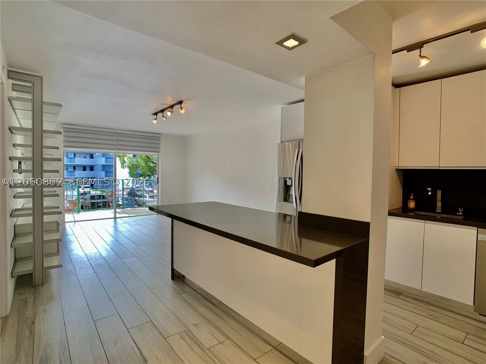 The most beautiful unit you will find for rent at The Fountains in Fontainebleau.  This unit is one of a kind.  Was truly fully renovated with excellent taste and style.  It has beautiful hardwood floors throughout, top of the line stainless steel appliances, quartz countertops, a beautiful custom built island to have dinner, modern bathrooms, large bedroom with built-in walking closet, nice modern light fixtures, and many other upgrades! Nice balcony to relax.  Excellent location located with easy access to FIU,  close to Turnpike, 836 & Palmetto Expressway.  Full ammenities to enjoy:  an olympic sized pool, gym, tennis courts, community room, security patrol, and plenty of guest parking.  Must see !