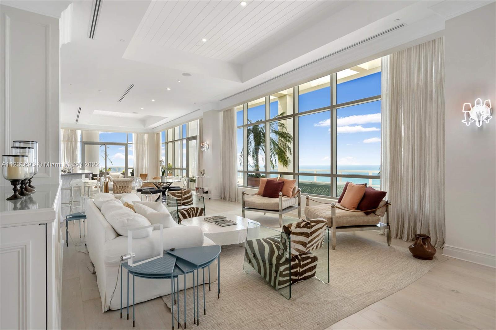 Once in a lifetime opportunity to own one or both penthouses at the iconic Fontainebleau where you have astounding views of the Atlantic ocean, Miami Beach, Biscayne bay & the Miami skyline, 5 star luxury service & a convenient Mid-Beach location.  An exquisite renovation of the 4500 SF,  5BD + 5BA + 2 !/2 BA unit has just been completed by Grade NY.   The casual elegance of the interior along w the large terr of 3300 SF make this PH the height of sophisticated resort-style living.  Natural light washes every room from the soaring windows. Keep you yacht at the Marina.  HOA includes Elec & wifi.  Delight in discounts on the hotel amenities such as the Lapis Spa & Hakkasan. The highly rated Rental Program provides worry-free ownership w no rental restrictions.  Live & play all day everyday.
