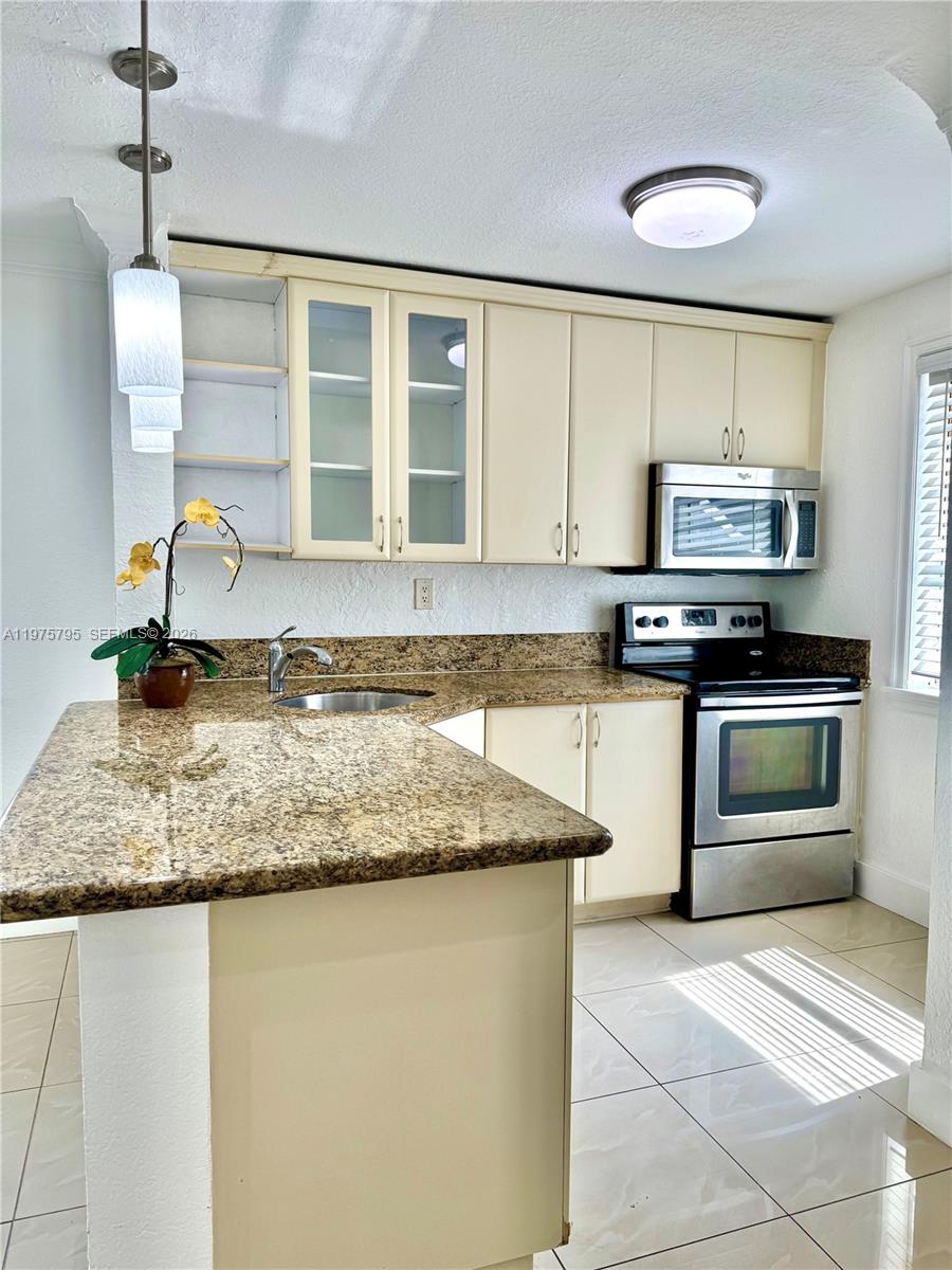 VILLAGE HOMES & CONDOS AT - Residential