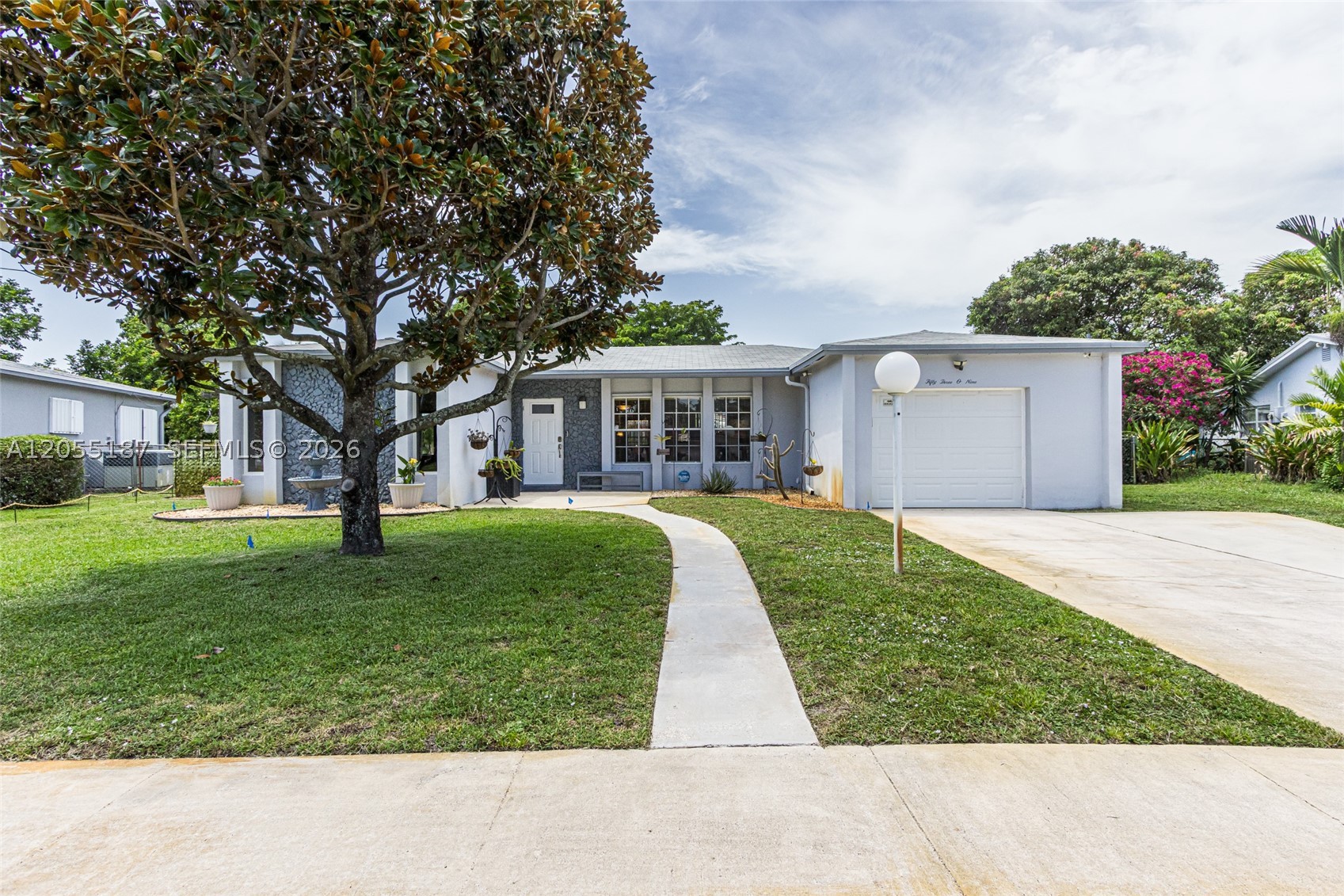 Wow! Look no further than this fantastic home in the desirable Oakland Hills community of Margate. This spacious 3-bedroom, 2-bathroom residence features a preferred split-bedroom floor plan and a large, very workable kitchen complete with natural stone countertops, stainless steel appliances, and a charming breakfast area. Both bathrooms have been tastefully updated, and the expansive Florida room offers a seamless transition to an incredible backyard oasis.

Enjoy the ultimate Florida lifestyle with your own private Tiki hut, a raised garden bed, and several storage sheds. The laundry room—equipped with new high-end front-loading appliances—is conveniently located just off the 1.5-car garage. Plus, the water softener is included! Oakland Hills is a PUD community with a remarkably low annual fee that provides access to a pool, tennis and pickleball courts, and a recreation hall. Perfectly positioned close to the very best of South Florida!