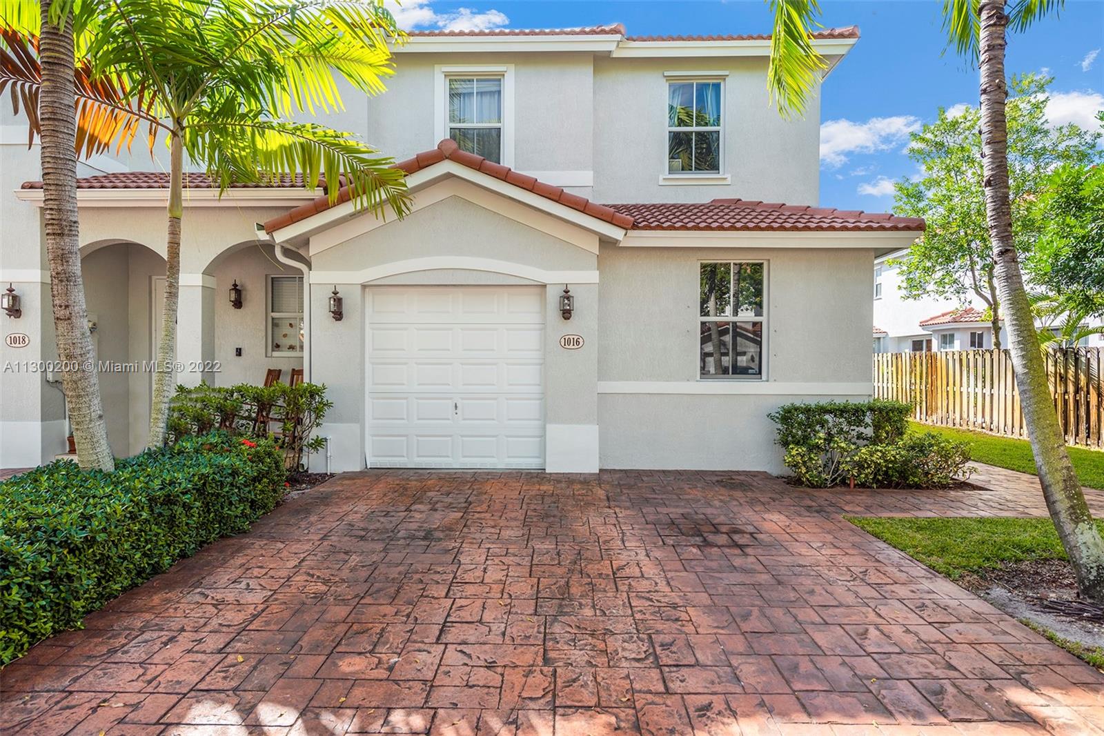 Beautiful gated community conveniently located close to I95 and Aventura with a beautiful community pool, club house and cabana. Corner house with 2 stories and lots of space for a comfortable and safe family living style. Enclosed back yard perfect for entertaining.  Low maintenance fee