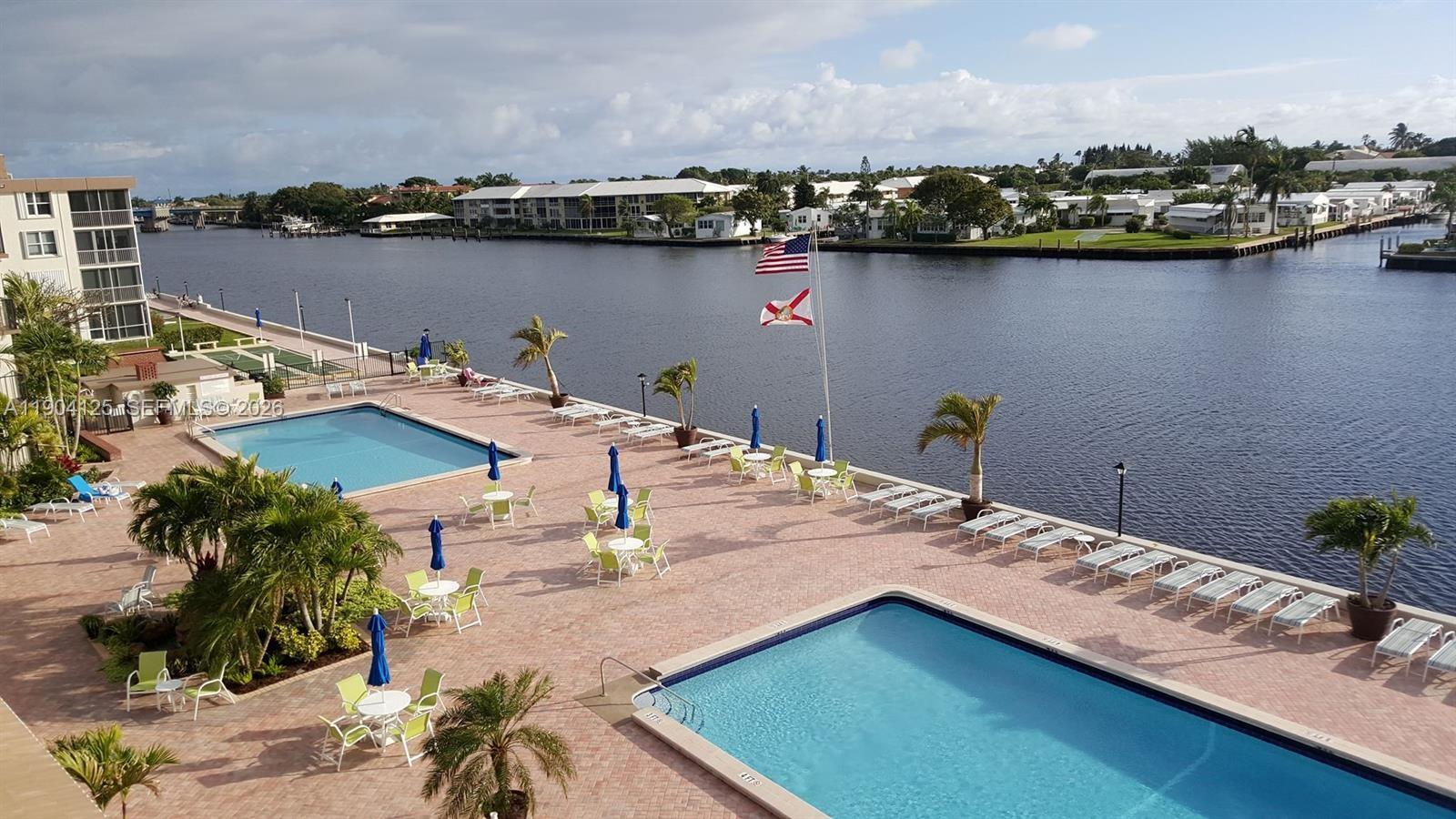 Turnkey living at its finest. This 55+ condo community right on the Intracoastal in
beautiful Boynton Beach, walking distance to shops and public transit, boasts an open-concept kitchen with all new cabinetry, flooring, and sparkling appliances. Fresh paint, sleek baseboards, and chic woodwork flow throughout, leading to a master bath adorned with a new vanity and glass shower. Walk-in closet with brand new carpentry built-ins give plenty of storage. Revel in the resort-style amenities including a clubhouse, gym, pool, and BBQ area, all perched by the Intracoastal canal offering stunning views. With the complex's extensive face lift nearly complete, expect a surge in value. A rare opportunity as very few 1/1s hit the market in Seagate.