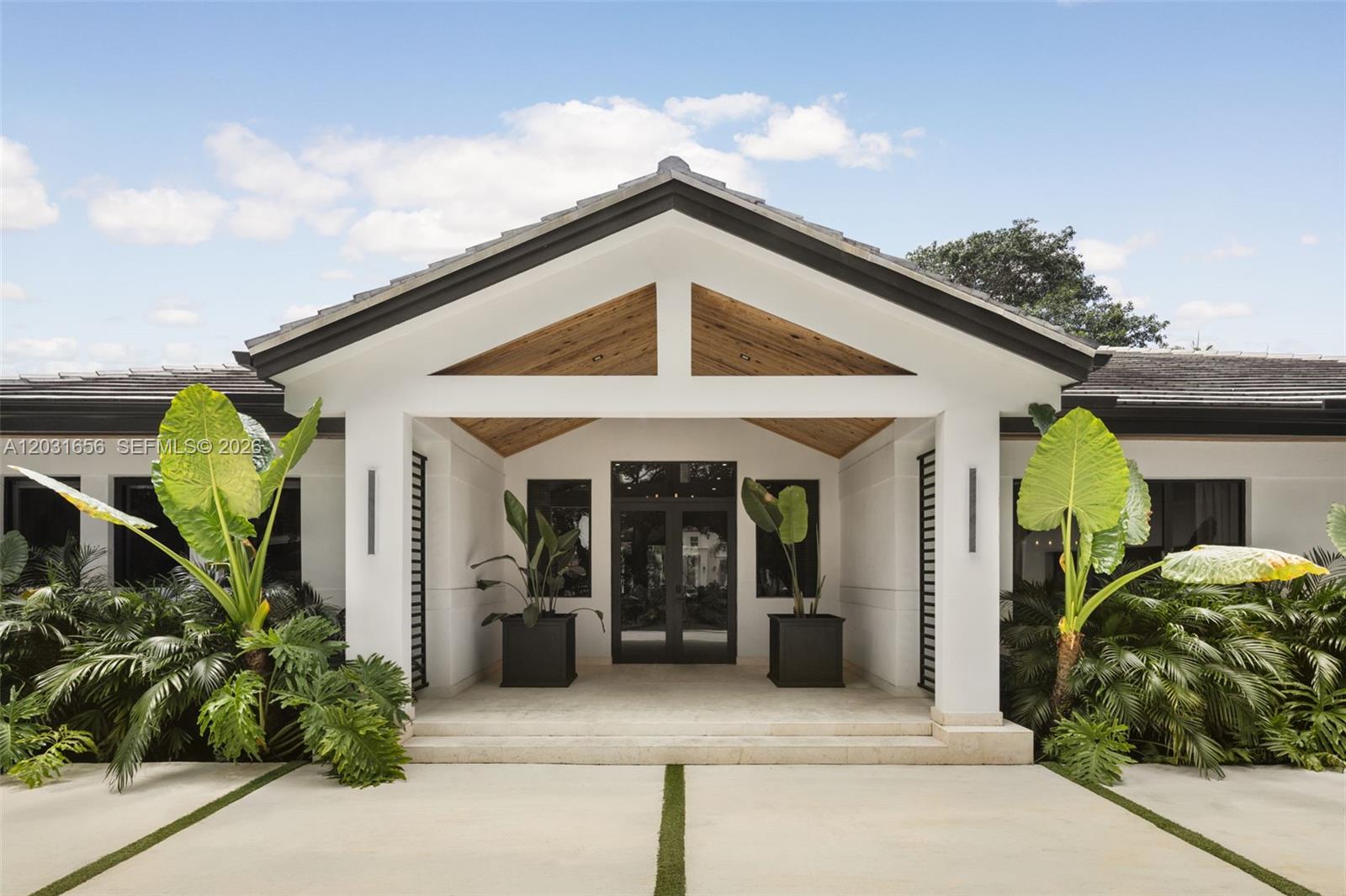 Completely reimagined in 2024 and offered fully furnished, this exceptional single-story estate sits on an expansive half-acre lot within the prestigious guard-gated community of Cocoplum. Thoughtfully curated by a professional interior designer, the residence blends timeless elegance with modern comfort, delivering a truly turnkey lifestyle.

Designed for effortless living and entertaining, the home features spacious light-filled interiors, soaring ceilings, refined finishes, and seamless indoor-outdoor flow. Floor-to-ceiling connections to the outdoors open to beautifully landscaped grounds, where a pool, spa, and expansive terraces create a natural extension of the home's living spaces.

One of the few single-story homes available in Cocoplum, this residence offers both privacy and convenience in one of Coral Gables' most sought-after communities, known for its 24-hour guard-gated security and exceptional location.

Ideally located near Miami's top-rated public and private schools, premier dining, luxury shopping, and major business districts, this move-in-ready estate presents a rare opportunity to enjoy the very best of South Florida living in one of its most coveted neighborhoods.