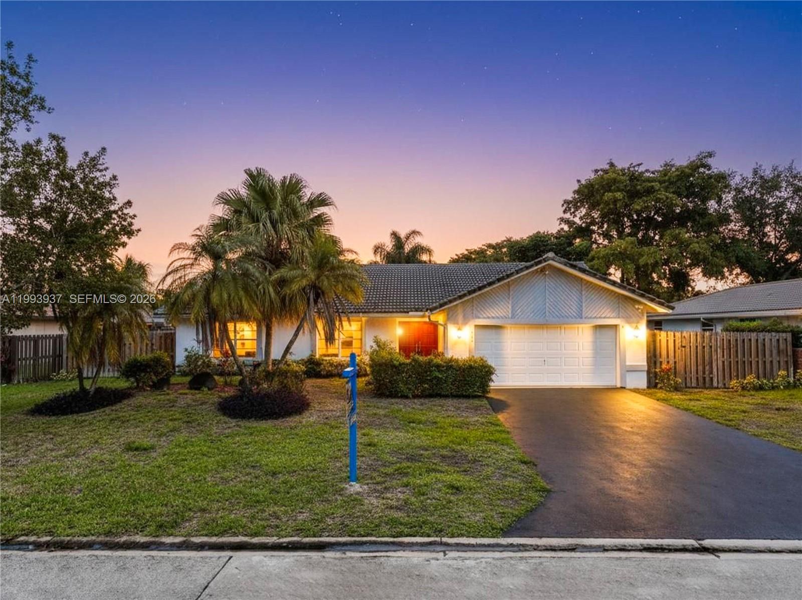 Welcome to this beautiful and spacious single-family home featuring 3 bedrooms, 2.5 bathrooms, and a versatile den perfect for a home office or additional living space, complete with a private pool. Situated on an oversized 11,253 sq ft lot, this home offers an open floor plan that seamlessly connects the living, dining, and kitchen areas—ideal for both everyday living and entertaining. The newly updated kitchen boasts ample cabinet storage and generous counter space. Enjoy high ceilings with an elegant chandelier and abundant natural light streaming through large windows and glass doors. The oversized primary suite includes a walk-in closet and a private en-suite bathroom with direct access to the pool area. Step outside to a large screened patio, perfect for relaxing or hosting guests, overlooking a fully fenced backyard with a pool. Additional features include a two-car garage with an electric car charger and an extended driveway providing plenty of extra parking. No HOA! Enjoy the immersive 3D virtual tour. May your best start here!