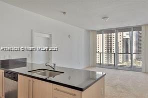 2/2 split floor plan with Carpet Floors. Open North/City Views. SINGLE PARKING SPACE assigned, European cabinetry, Stainless steel appliances. Floor to ceiling Windows with access to the balcony from the living room and bedrooms. Wide balconies. BEST LOCATION in the heart of Brickell. Steps to Mary Brickell Village. Across from people and metro rail. Luxury building designed by award winning Arquitectonica.