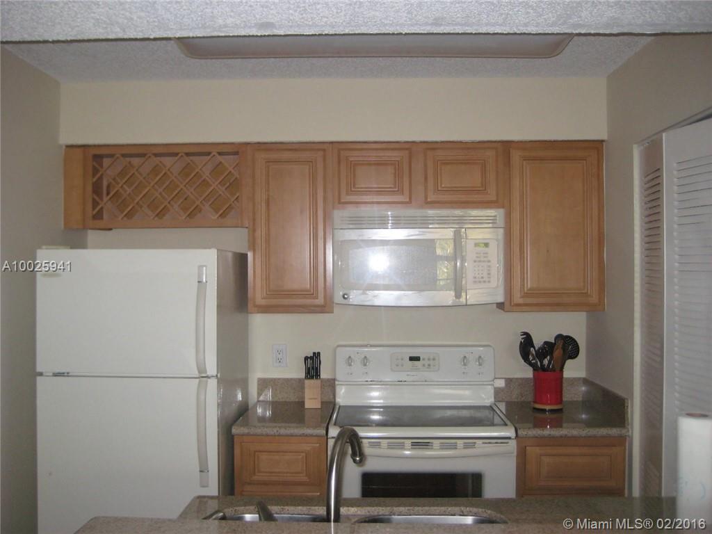 2nd Floor Unit, 1 BR/1BR, Newly remodeled bathroom, Brand new AC. Perfectly located to close to main entrance, club house, fitness center, pool and business office.  Excellent condition. Association Approval.  Close to major hwy's, airport and many extras. Stove and microwave will be replaced. .