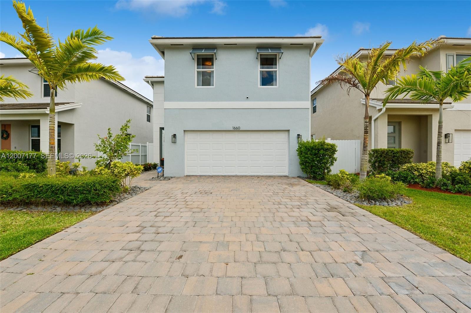 Stunning two-story home built in 2024 in a beautiful community. The interior features tile flooring, modern finishes, and a seamless flow between the living, dining, and kitchen areas.

The chef-style kitchen boasts a large center island, sleek cabinetry, stainless steel appliances, and ample counter space. Generously sized bedrooms upstairs, including a spacious primary suite with a large walk-in closet and an en-suite bath.

Additional highlights include impact windows and doors, a whole-home water softening system, an A/C UV system, a dedicated laundry room, and a 2-car garage. The home also offers great curb appeal with a paver driveway and a covered entry.

Enjoy a private backyard with room for a pool and outdoor activities. Conveniently located near shopping, dining, schools, and major highways, this home offers comfort, space, and convenience in a sought-after Homestead location.