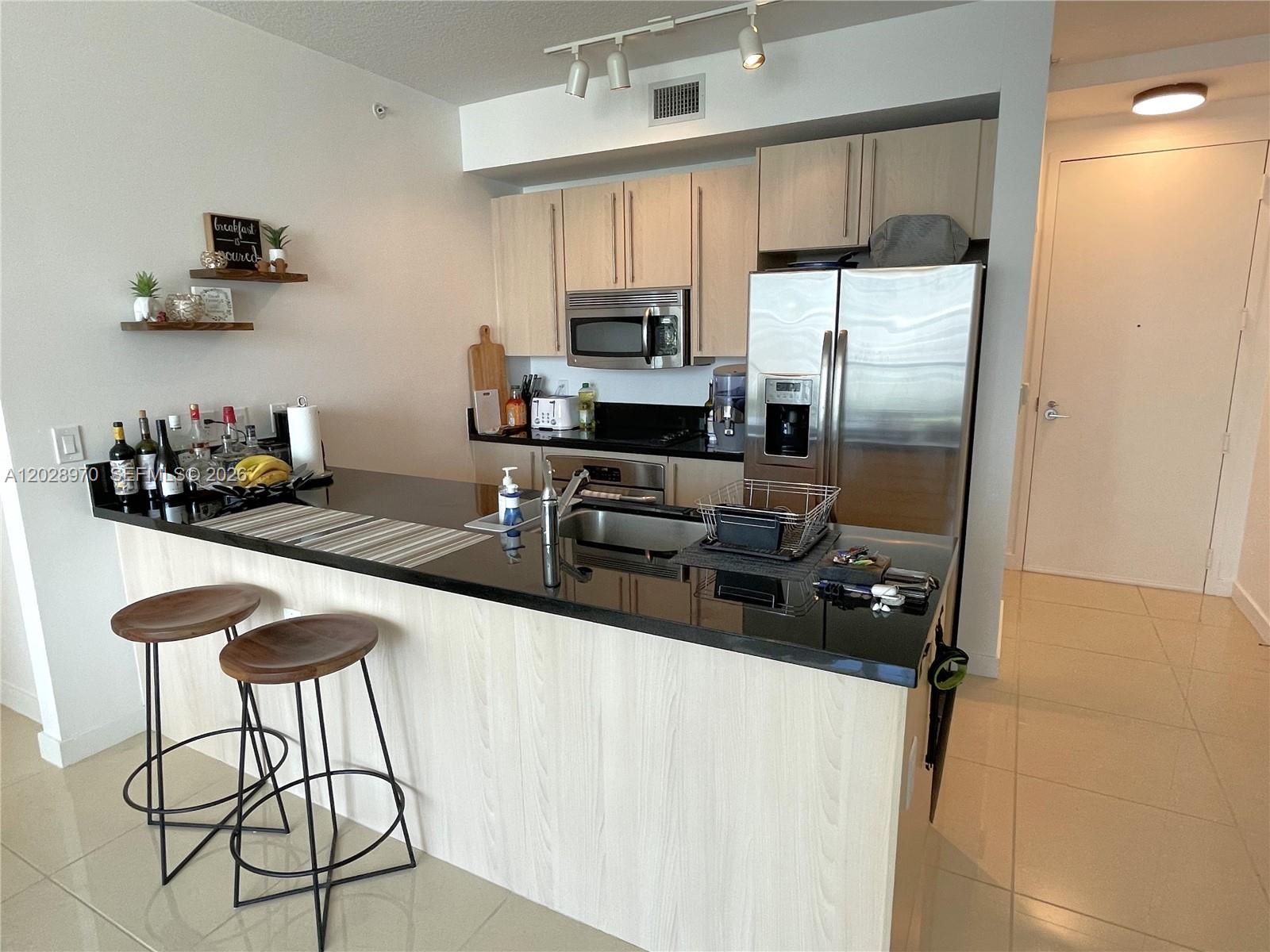 THE AXIS ON BRICKELL COND - Residential Lease