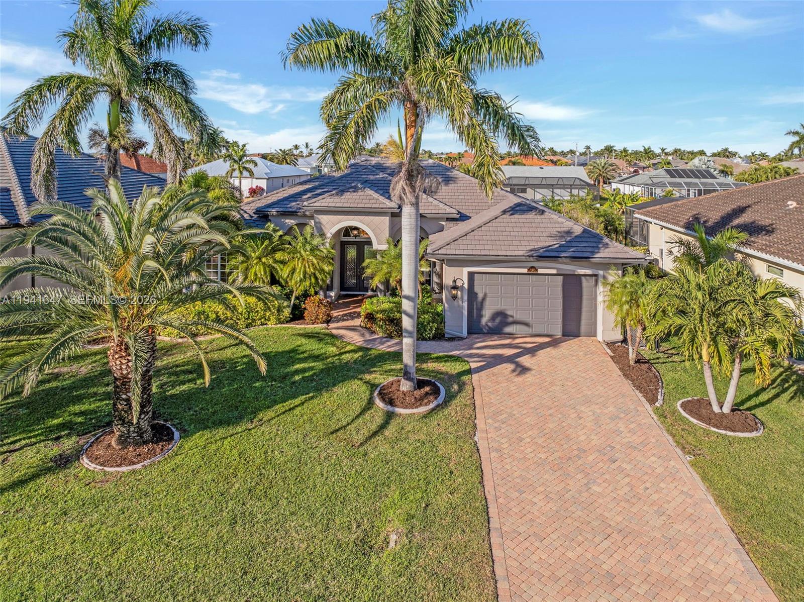 This beautifully maintained Cape Coral home offers a perfect blend of comfort, style, and Florida lifestyle appeal in a highly desirable southwest location. Designed with an open, inviting layout, it features spacious, light-filled living areas that create a warm and welcoming feel throughout. Recent updates including a new roof and fresh exterior paint enhance curb appeal and provide long-term peace of mind.

The kitchen serves as the heart of the home, seamlessly connecting to dining and living spaces ideal for both everyday living and entertaining. Generously sized bedrooms provide comfort and privacy, while the primary suite offers a peaceful retreat with ample closet space and a well-appointed bath. A whole-house Generac generator adds dependable backup power for year-round convenience.

Outdoors, the property shines with a private pool and spa, along with a 10,000-lb boat dock providing easy access to the waterways and a true boating lifestyle. Located on a quiet canal just minutes from open water, it’s ideal for boating and fishing enthusiasts while still offering a serene, relaxed street setting.

Offered fully furnished, this home is turnkey for immediate move-in or rental potential. Situated in a well-established neighborhood close to waterfront dining, shopping, parks, marinas, and top-rated schools, it’s a strong option for both full-time living and investment, delivering the best of Cape Coral’s laid-back yet refined lifestyle.