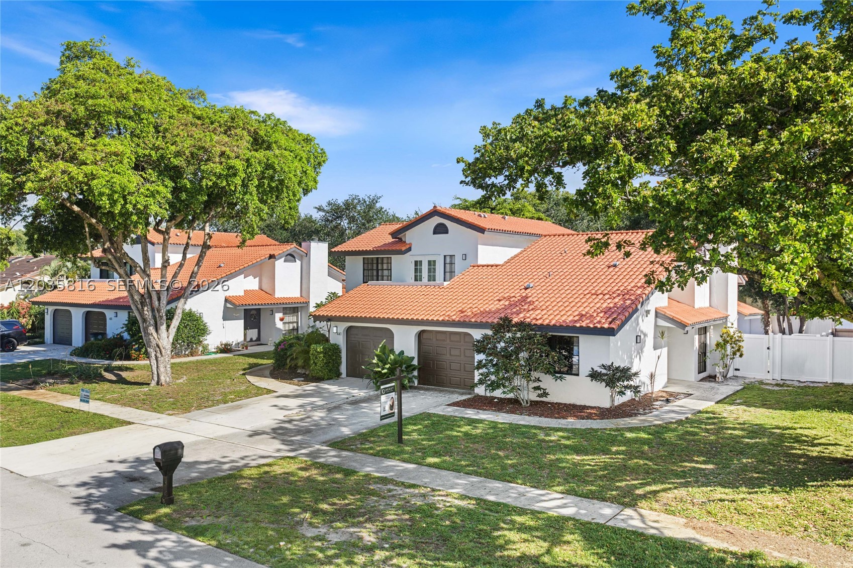 Located in one of East Boca Raton's most sought-after neighborhoods, this charming 2 bedroom, 2 bathroom corner villa offers the perfect blend of location, character and opportunity. Tucked away on a private corner lot, a welcoming walkway leads to the front entrance where you'll immediately be greeted by soaring vaulted ceilings, an open living area, a cozy wood-burning fireplace and a desirable split-bedroom floor plan.  The spacious backyard is fully fenced with brand-new PVC privacy fencing, creating the perfect setting for entertaining, relaxing, or letting pets roam freely. A one-car garage and abundant natural light add to the home's appeal, while the flexible layout offers endless possibilities to make it your own.  Location truly sets this property apart. Enjoy being just minutes from Boca's pristine beaches, including Spanish River Beach and its popular dog park, approximately 5 minutes from downtown Boca and Mizner Park's renowned shopping, dining, and nightlife and conveniently close to Florida Atlantic University, Palm Beach State College, I-95, and Brightline. Best of all, there is NO HOA, the community is FHA/VA approved, and rentals are permitted immediately, making this an exceptional opportunity for both homeowners and investors alike. Rarely do you find this combination of freedom, location and potential in the heart of East Boca.
