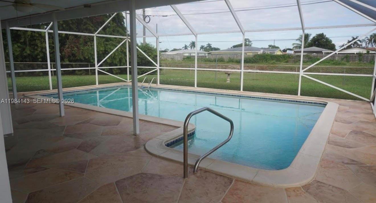 This well-kept 4-bedroom, 2-bath ranch sits on a spacious .27 acre corner lot, offering privacy, comfort, and easy living. Enjoy a bright interior, a screened-in pool, on a canal waterfront property and a 1-car garage, all in a quiet, convenient location close to everyday amenities. 2025 A/C. A great blend of space, relaxation, and Florida lifestyle. Only serious buyers, DO NOT BOTHER TENANTS. Call listing Agent for showings.
