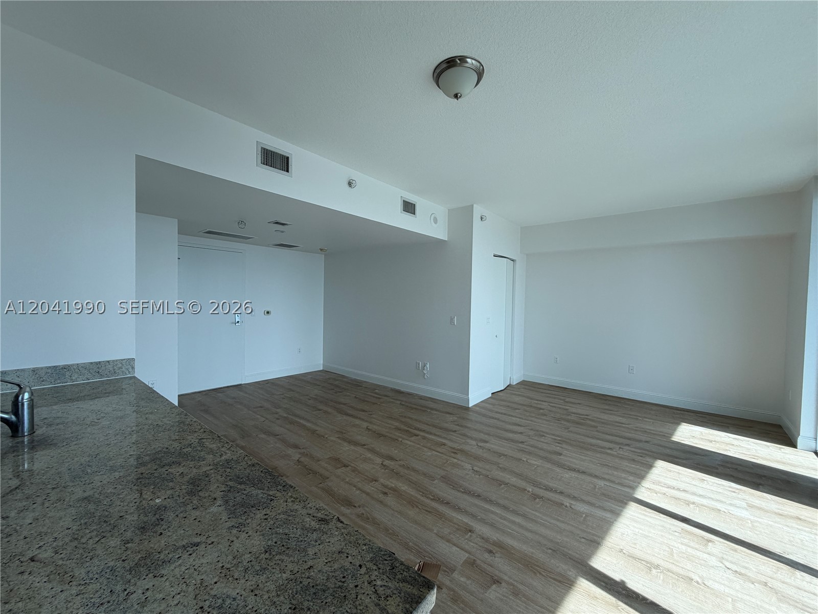 This exceptionally spacious studio on the 32nd floor offers stunning views of the Miami River and Biscayne Bay from its prime Brickell location. Featuring 580 square feet of interior living space, the unit boasts a full-size kitchen, a large walk-in closet, and an in-unit washer and dryer for added convenience. Recently refreshed with new flooring and fresh paint, the residence is move-in ready and includes one assigned self-parking space. Basic cable, internet, and water are included in the rent. Just steps from Brickell’s premier dining, shopping, entertainment, and nightlife, this is a rare opportunity to enjoy urban living at its finest. Association approval typically takes approximately one week with a complete application, and there is a $150 application fee per adult. Please note that the pool is currently under construction, and no exact reopening date has been provided. This is a must-see opportunity in the heart of Brickell.