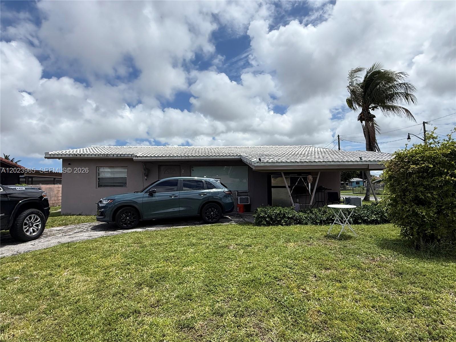 Great opportunity in Pompano Beach! This 4-bedroom, 2-bath home sits on a spacious corner lot of approximately 7,038 sq ft and offers plenty of potential for investors or buyers looking to update and customize a property to their taste. The home needs renovations and updating, but features a flexible layout with the possibility of creating a separate area for rental income, in-laws, or extended family. Excellent value-add opportunity in a growing area. Property sold AS-IS.