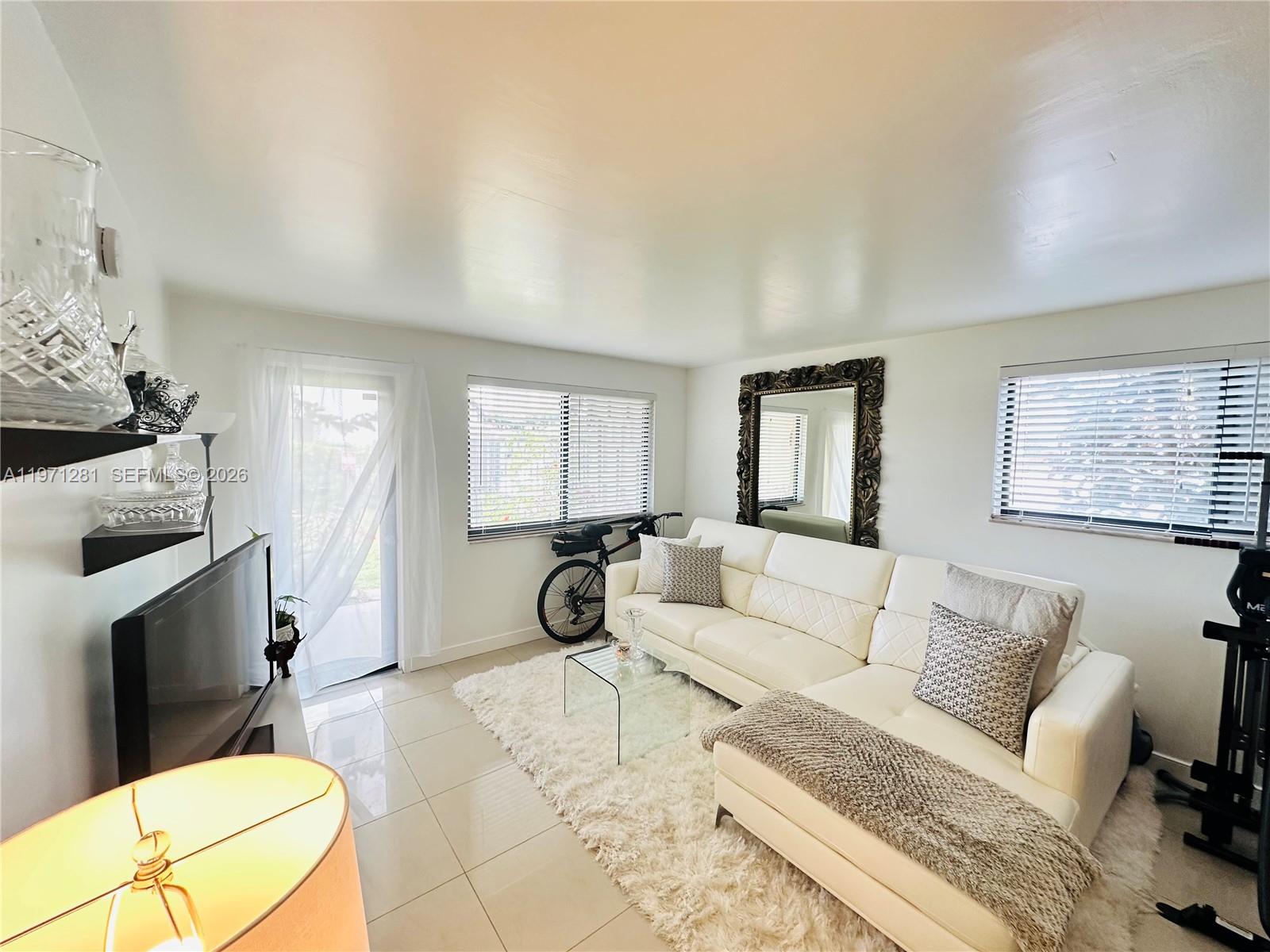 RENT RIGHT AWAY OR MOVE-IN! Amazing 1st floor  condo with peaceful garden views ,no stairs ,sold fully furnished and turn key . This unit features a MODERN KITCHEN with custom white cabinets, granite countertops and new ''SAMSUNG'' S.S. appliances. Bright living room, well furnished with recessed lighting. Gorgeous bathroom, updated shower and  toilet. Spacious Bedroom facing the garden with lots of closet space. PET Friendly. BOAT DOCK. Hot water included in HOA. Rent right away, 3 x / year. 1 mile from the BEACH ! Shows like a dream :-)