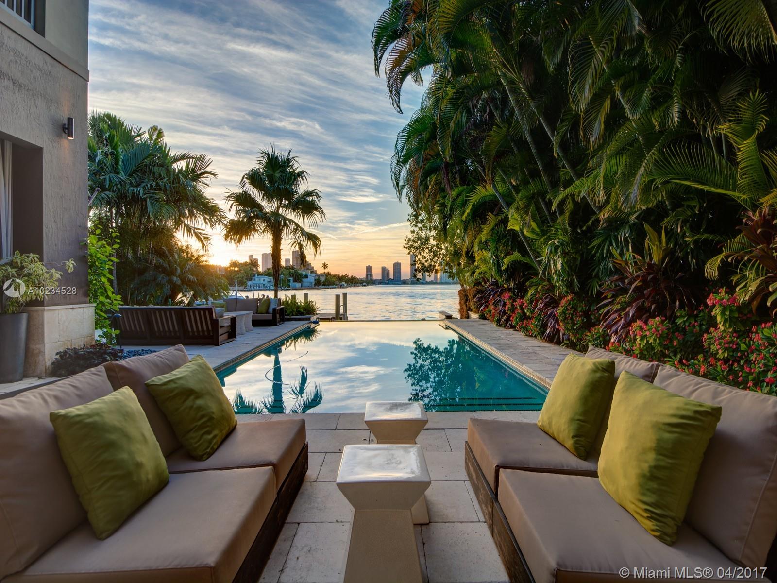 Beautiful Modern 8 bed 8 1/2 bath with stunning westerly Miami skyline and wide bay views. The home was recently renovated with luxurious interior design by Allen Saunders, spacious master suite with his/her dressing rooms, large living and dining areas with adjacent chef's kitchen. Lush terraces and outdoor seating  summer kitchen, bar, cabana bath, infinity edge pool, hot tub and boat dock. Also available for rental, $45,000.00 monthly.