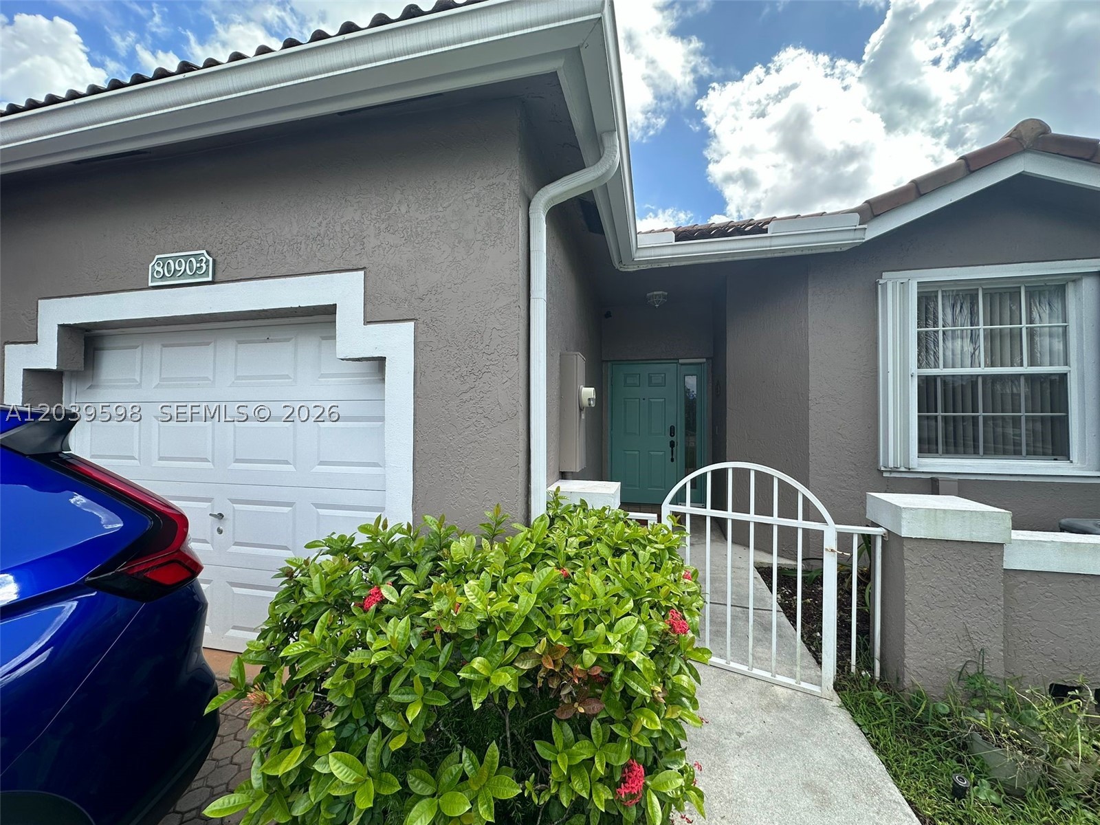 Beautiful Villa with 2 bedrooms, 2 bathrooms and a 1 car Garage. Vaulted ceiling through out. Ceramic tile in foyer and kitchen, carpet in bedrooms and living room. Large eat-in kitchen. Separate laundry room with full size washer and dryer. Large master bedroom with a sitting area and two large closets. Newer AC and Water Heater. Association fee covers cable tv, security alarm, painting of exterior, pressure washing of roof, security patrol, basketball court, tennis court, 2 pools, gym, and club house. Community is one of the best kept secrets of Sunrise. Don't miss out!