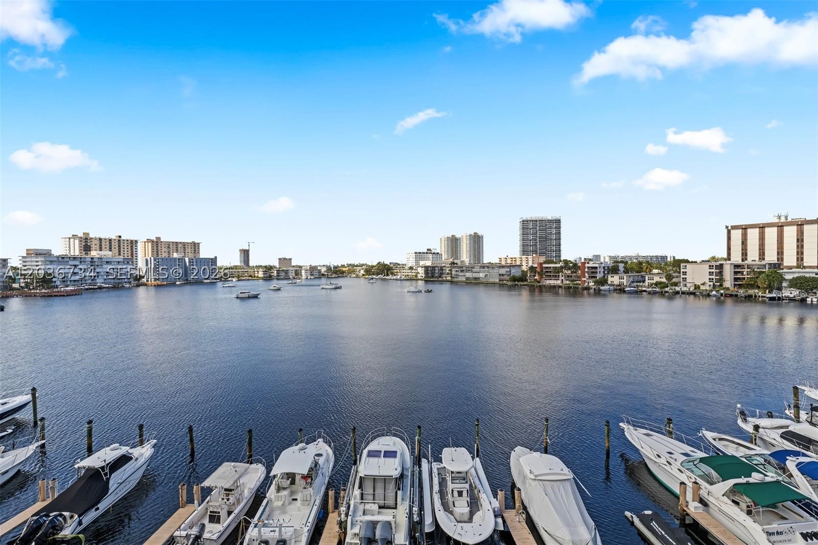 Rare 2/2 Lakefront Penthouse Condo totally modernized with a deeded DOCK for your Florida lifestyle. Casual Secured Boutique building in Golden Isles, 4 private units per floor, Laundry outside your door. Pool, storage, Assigned parking. Close to dine, shop, worship, Gulfstream Casino & Village shopping, beach across the bridge. between A1A and US1. Easy access to I-95, tpk, etc. Between Miami and Ft Lauderdale for events and work. Dock space 16' wide and suggested length approx 48 to 54'. 6 FT depth. Water provided, Metered electrical. No fixed bridges. Easy to view.
