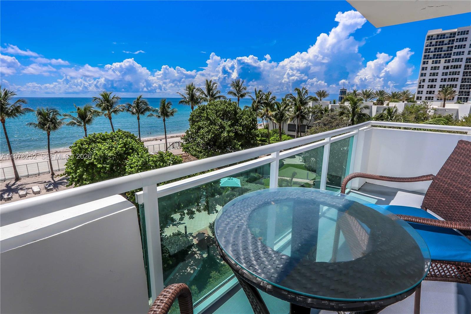 Rare find! One of the best locations and views in the building! This South-East corner 2 bed/2 bath unit offers stunning, unobstructed ocean views mixed with beautiful foliage. The spacious main bedroom faces the ocean, while the second bedroom captures additional south-facing ocean vistas. Natural light pours in through large windows throughout. The kitchen and primary bathroom feature elegant granite countertops, with the primary bath offering double sinks and a glass-enclosed shower. The second bathroom boasts a walk-in shower with a sleek glass enclosure. Great amenities such as gym, pool, spa, sauna, etc completes this wonderful ocean front retreat! Unit comes with 2 unassigned parking spaces and has passed the 50-year inspection. A fantastic opportunity not to be missed!