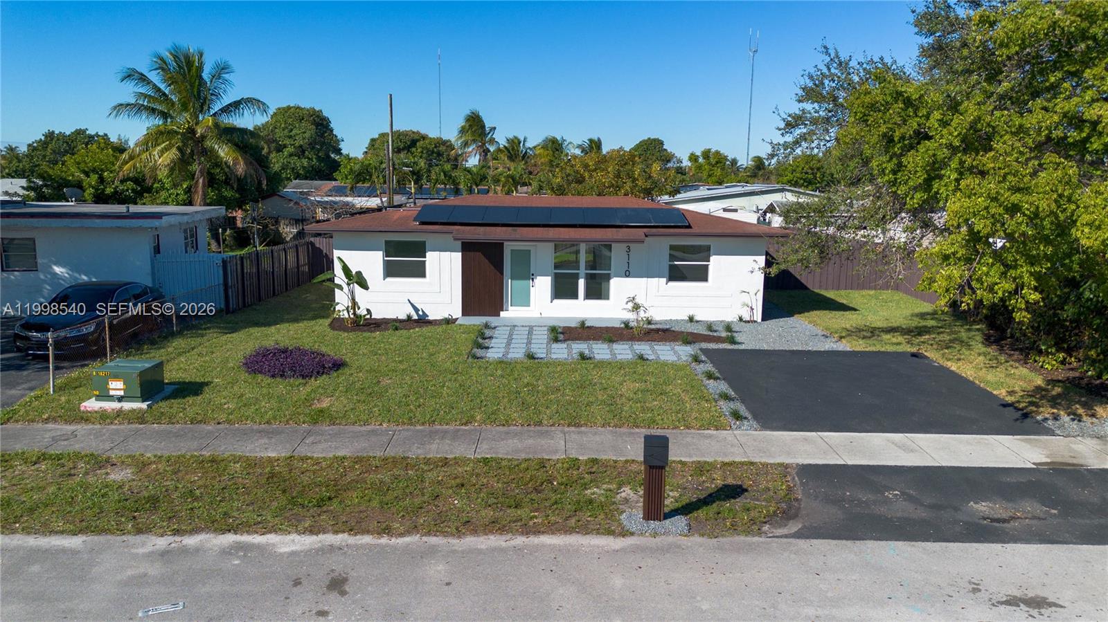 Beautiful 3 bed, 2 bath home in a prime location near I-95. Features a spacious backyard perfect for entertaining, modern finishes throughout, and fully paid-off solar panels for energy savings.