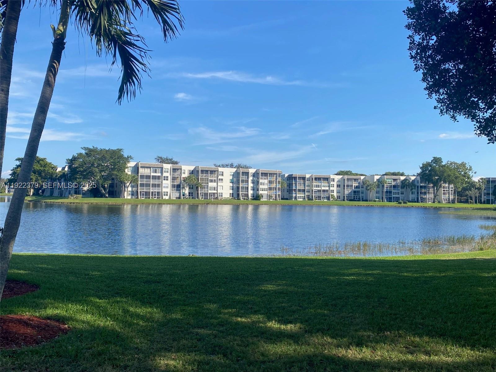 Move-in ready and beautifully renovated lakefront condo! This pristine 2-bedroom, 2- bath residence offers peaceful water views and numerous upgrades throughout. The kitchen features stainless steel kitchen appliances and the bathrooms include elegant marble flooring. Major improvements provide peace of mind, including a newer roof, AC, water heater, and a brand-new electrical panel installed in August 2025. All of the amenities you've been dreaming of. You can use any of the three pools, play golf, or use the fitness center at no additional cost. To make a deal even sweeter-the seller will pay the remainder of the 40 year special assessment at closing. Did I mention the A-rated schools in the neighborhood? Don't miss out! Please note, an additional special assessment, expected to begin in August 2026, is estimated at approx. $5,000 and will fund the renovation of the elevators and pavements.