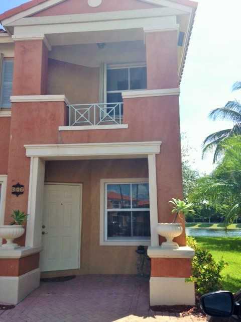 THE GATES AT DORAL ISLES - Residential Lease