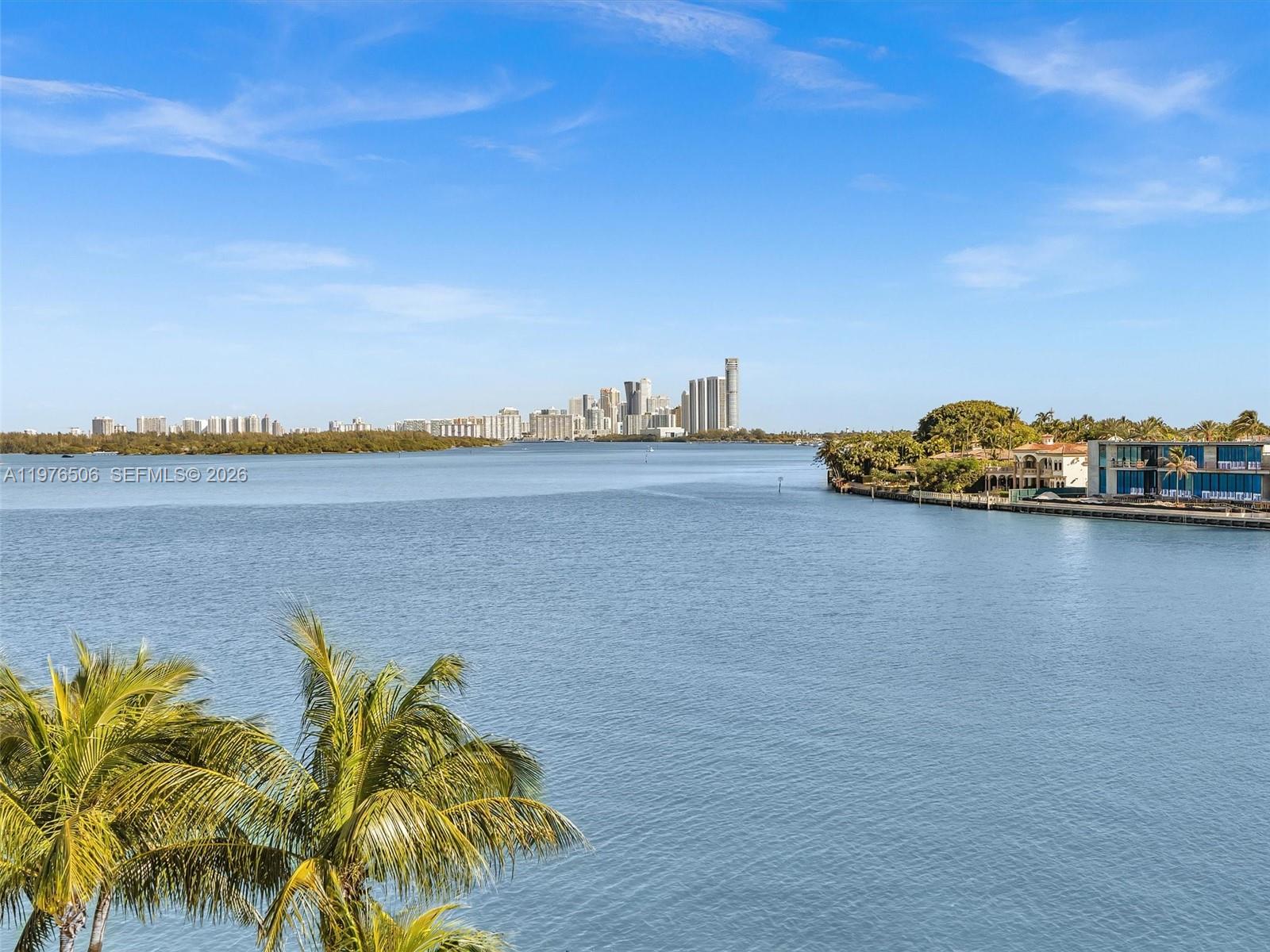 This is a WOW! Experience some of the best views in Bay Harbor from this stunning corner residence at the luxurious waterfront Sereno Residences. This rare four-bedroom + den offers spacious, light-filled interiors in one of the most desirable full-service buildings in the coveted 33154 zip code. Enjoy a stunning rooftop pool and lounge area—perfect for taking in breathtaking sunrises and sunsets. An ideal setting for entertaining, complete with a BBQ and dedicated dining area for effortless indoor-outdoor living. Ideally located within walking distance to the beach, houses of worship, and top restaurants, this residence combines luxury living with everyday convenience. The unit features private elevator opening to entry foyer and includes two assigned parking spaces and additional storage. Dock available.