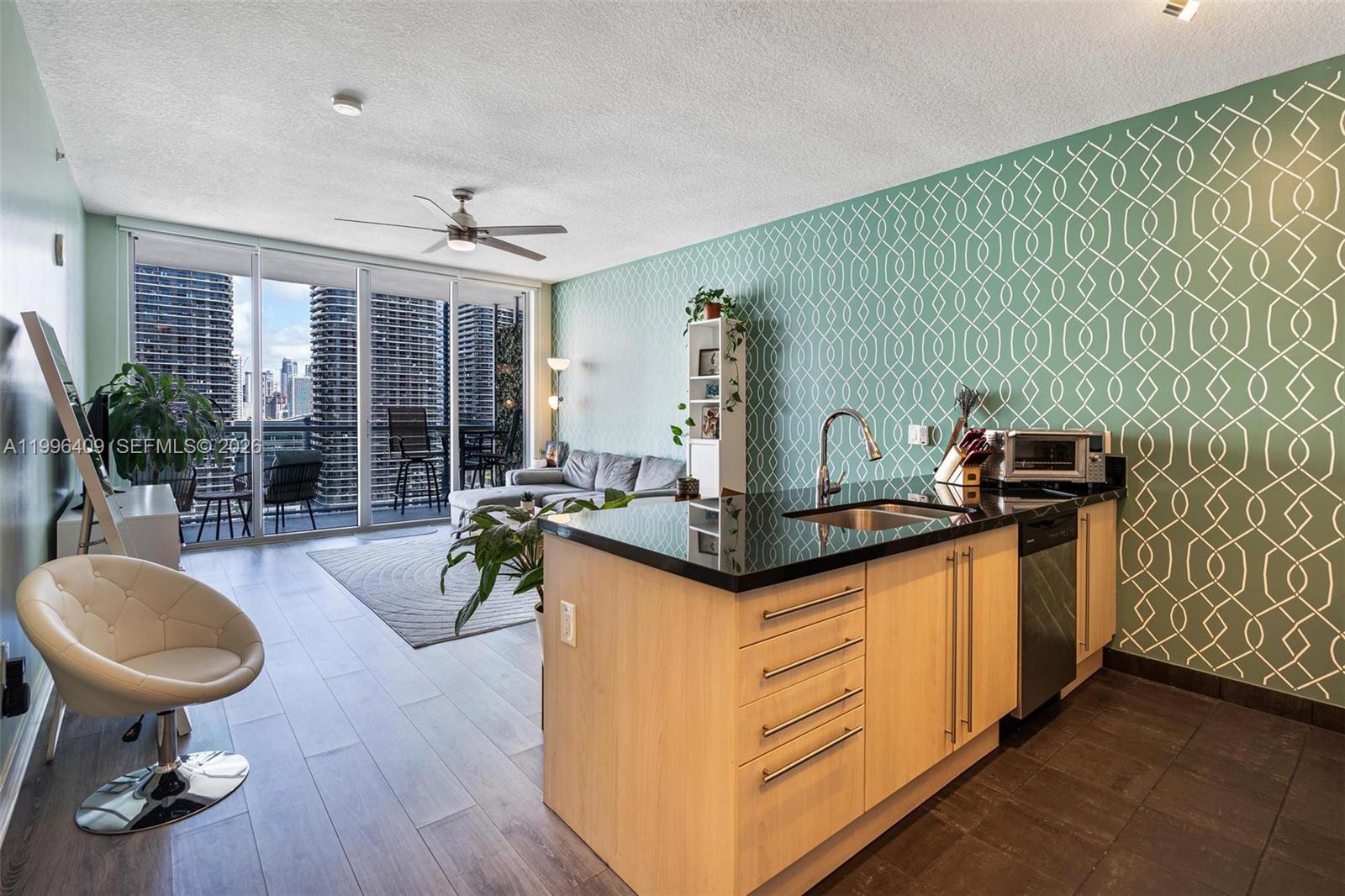 Fully updated 1-bedroom, 1-bathroom residence in one of Brickell's most amenity-rich buildings, with open city views and a generous private balcony. Every major system and finish has been addressed, so the next owner walks in and does nothing.
Upgrades include LED and dimmable kitchen lighting, modern ceiling fans, motorized bedroom shades, fresh paint, updated hardware, a new bathroom vanity, WiFi-enabled washer/dryer, newer stove, refrigerator, water heater, and a full HVAC replacement with UV light filtration and Nest thermostat.
The approximately $7,000 special assessment has been paid in full by the seller. No surprises at closing.
Axis delivers resort-style living with two pools, cabanas, spa, fitness center, lounges, BBQ area, billiards, playroom, and more. One assigned covered parking space included. Steps from Metrorail, Brickell City Centre, Mary Brickell Village, and some of Miami's best dining and nightlife.
Strong rental demand in the area, with estimated income around $3,000/month, making this equally smart for primary buyers and investors.