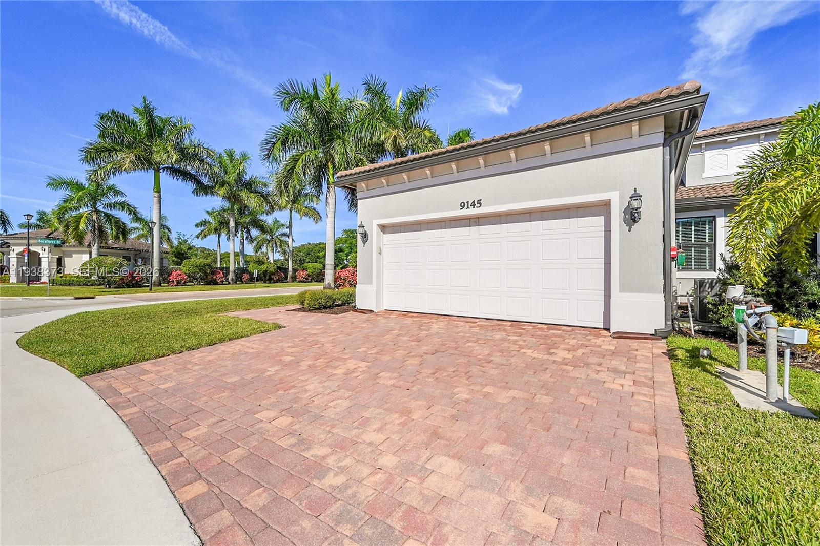 Beautiful 2BR/2BA + DEN. Corner villa with a 2-car garage in the highly desirable Boca Flores community. One of just 130 homes built in 2021 by Pulte Home Builder. This residence offers the feel of new construction with hurricane-impact windows and doors throughout. Bright and airy with abundant natural light and added privacy from having no neighbors on one side. Volume ceilings, and other features that include an open, functional layout and a dedicated laundry room with utility tub. Located in an upscale, guard-gated 55+ community that offers walking paths, parks, and community pool. Pet-friendly! Florida living in a prime Boca Raton location.