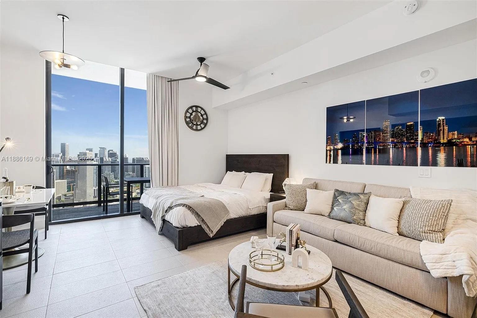 Your Luxury Escape in the Heart of Miami: Penthouse with Espectacular Views and Total Flexibility Imagine waking
up in a dream penthouse, fully Furnished, where every detail invites relaxation. This penthouse at Natiivo Miami is
not just a home, but a flexible investment, with Airbnb approved and/or any type of rental (daily, weekly, monthly,
or annual). Your freedom, with no restrictions! The location is unbeatable: cross the street to get to the Kaseya
Center, or walk to Bayside and the city's most famous festivals. The building is a resort/type with over 70,000 sq ft
of amenities, including 5 restaurants, a spa, a gym, and a pool. It's your gateway to a luxurious Miami life!