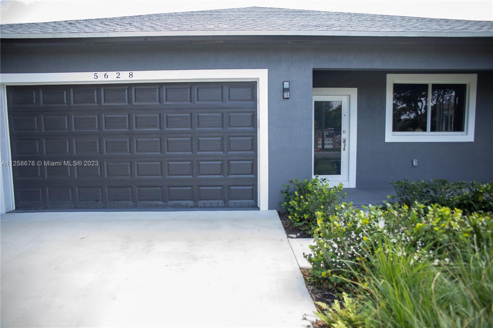 Beautiful new construction single family home. Spacious home 3bd/2 full bth comes with a lot of upgrades and amenities. It includes 2 car garage with remote garage openers and garage keypad for access. Huge living room plus family room. Kitchen includes quartz counter tops, all stainless-steel appliances, refrigerator with computer screen, garbage disposal, L shape countertop. Elegant 10ft ceilings with crown molding and vinyl flooring throughout the home and tile in both bathrooms which also have double decorative bowl sinks. Fabulous roomie master bedroom with walk-in closet with sturdy wood shelving, sliding impact glass door that leads to a covered back porch. Covered front and back porches. Impact windows and doors. Automatic sprinkler system with digital timer and rain sensor.