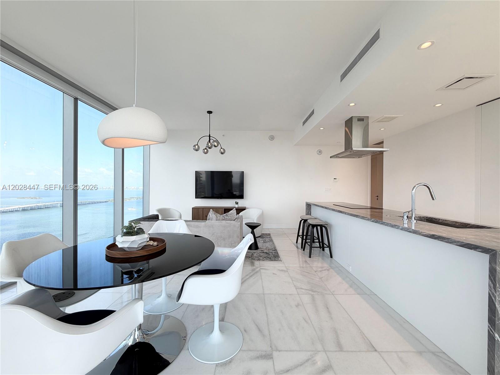Experience luxury waterfront living at Missoni Baia Residence 3206, a stunning 2-bedroom, 2-bathroom residence offering breathtaking panoramic views of Biscayne Bay and Miami’s spectacular sunsets from both the living room and primary suite.
Designed with elegance and sophistication, this home features marble flooring throughout, floor-to-ceiling impact glass windows, custom Italian cabinetry, a gourmet kitchen equipped with premium Wolf and Sub-Zero appliances, and a built-in wine cooler—perfect for entertaining and everyday enjoyment.
Residents of Missoni Baia enjoy access to an exceptional collection of resort-style amenities, including three waterfront pools, a whirlpool spa, tennis court, state-of-the-art fitness center, full-service spa with sauna and steam rooms, private treatment rooms, hair and nail salon, movie screening room, game lounge, children’s play area, and pet spa.
Additional conveniences include 24-hour concierge service, valet parking, security, and beautifully curated indoor and outdoor social spaces designed to elevate your lifestyle.
Ideally located along Miami’s vibrant waterfront, Missoni Baia offers the perfect blend of luxury, comfort, world-class amenities, and spectacular views, creating an unparalleled residential experience in one of the city’s most prestigious addresses.