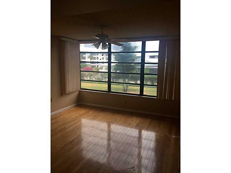 Amazing Unit with wood floors in desirable Whitehall condominium!