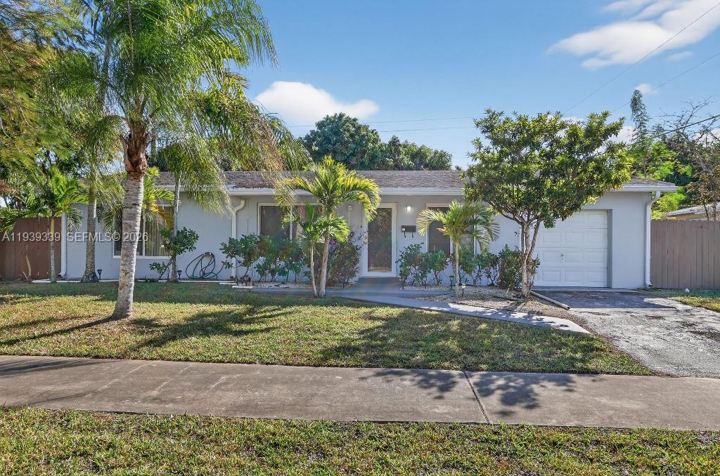 Lovely four bedroom, two bath 1,400 square foot home in the Fairway Park neighborhood of Miami-Dade County.  The home features new impact windows, a remodeled bathroom and new appliances situated on a large 9,000 square foot corner lot.  All bedrooms feature laminate flooring. One bedroom has a separate side entrance door.  Home includes a large screened Florida room and backyard walk-in shed.  Additionally, the backyard contains a large concrete slab for a boat or additional vehicles that is accessed through a gate at the side of the house.
The Roof is 11 years old and water heater was installed 2 ½ years ago.  Home includes a new inverter in one of the bedrooms.
 storage.  Back yard contains coconut, mango, avocado, lychee and palm trees.

Actual Area 1,463 Sq. Ft
Living Area   1,025 Sq. Ft
Adjusted Area 1,222 Sq Ft