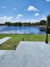 Come see an adorable 2 bedrooms and 2 bath home with a double garage and a large patio. Florida room can easily convert into 2 additional room and use the enclose patio as a family room. Tranquil lake at the back to enjoy the view; the view is spectacular and lake has retaining wall. Screened patio at the back to relax, barbecue or just extra storage. Driveway is wide for plus 4 cars. A/c is a few months old, new washer, dryer, refrigerator, dishwasher all are new. Owner has enjoyed this home and neighborhood is quiet and close to the FL Turnpike. Showings is easy just contact the agent.