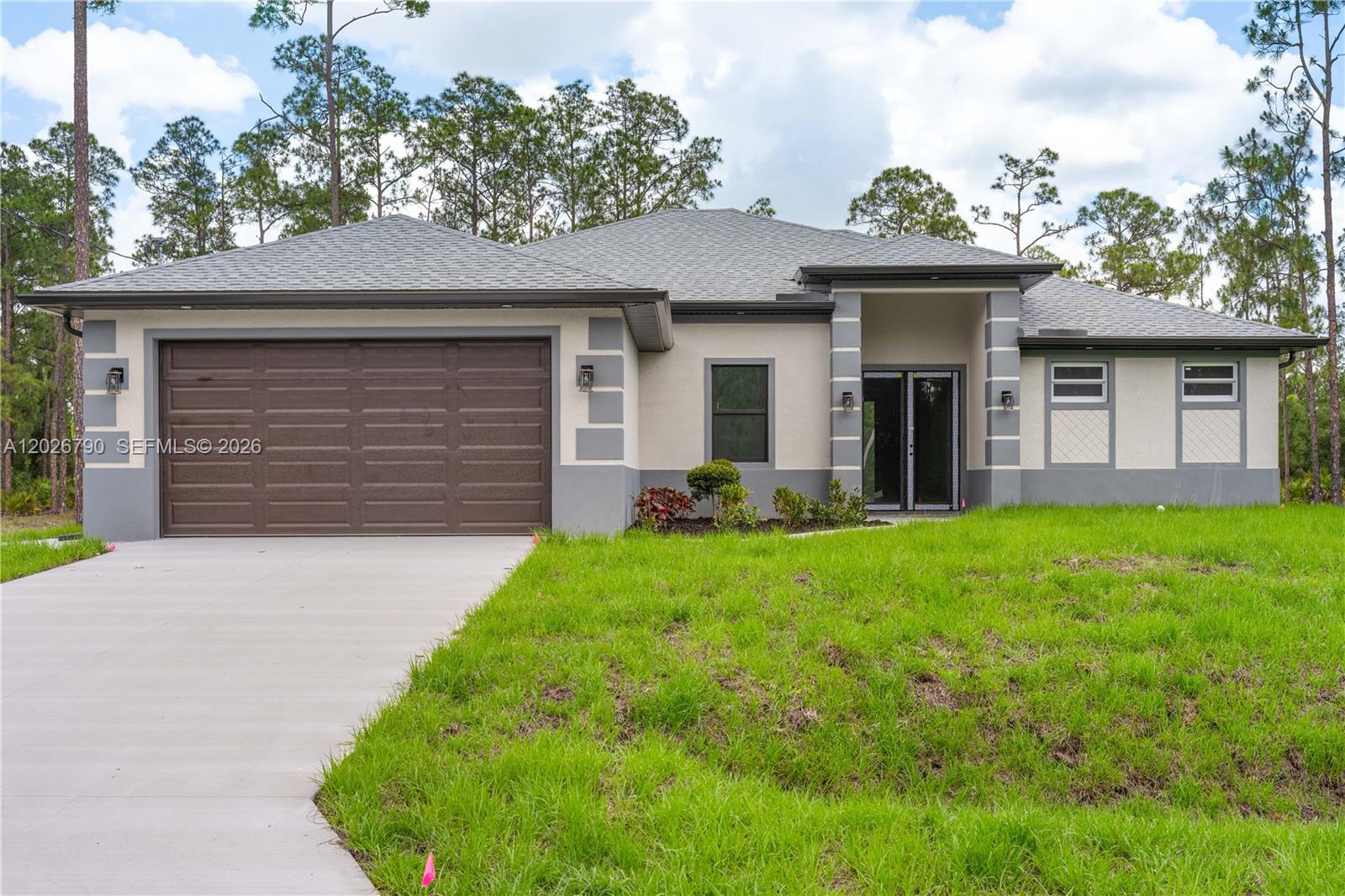 Looking for a home with spacious living areas and privacy? This new construction home offers 2,009 square feet of living space on a half-acre lot. Featuring an open-concept layout, the kitchen includes quartz countertops, quality appliances, and plenty of space for everyday living and entertaining. With 4 bedrooms and 3 bathrooms, this home is designed for comfort, family living, and hosting guests. Throughout the home, you’ll enjoy high ceilings, modern architectural details, and tile flooring throughout. Impact windows and doors provide both security and peace of mind. The spacious lanai is ready for a summer kitchen, with room for a fridge, outdoor cabinets, and the perfect setup to enjoy cookouts and gatherings with family and friends. Come take a look at this beautiful new home.