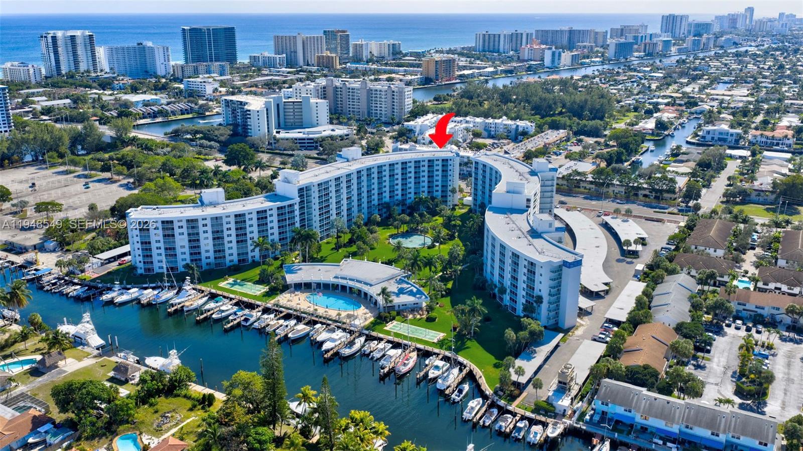 WOW! Location, views, and true penthouse living. This exceptional corner PENTHOUSE at Sea Haven Condominium & Marina in Pompano Beach offers stunning marina and canal views! A rare opportunity to enjoy coastal living from above with privacy and an unbeatable vantage point.This 1-bedroom plus den, with 2 full bathrooms residence features a unique layout with porcelain tile flooring throughout, and abundant natural light from oversized windows. Impact windows in the  bedroom and bathrooms, along with impact balcony sliders, provide comfort and peace of mind. You can even see the ocean from the bedroom window. Step onto the private balcony to relax and enjoy watching the boats go by. Offered fully furnished, this penthouse is move-in ready and ideal as a full-time residence, seasonal escape, or investment. Sea Haven offers resort-style amenities including a waterfront heated pool, clubhouse, fitness center, marina, and more. Just minutes from the beach, dining, shopping, parks, and the fishing village. Wow! Rare opportunity!