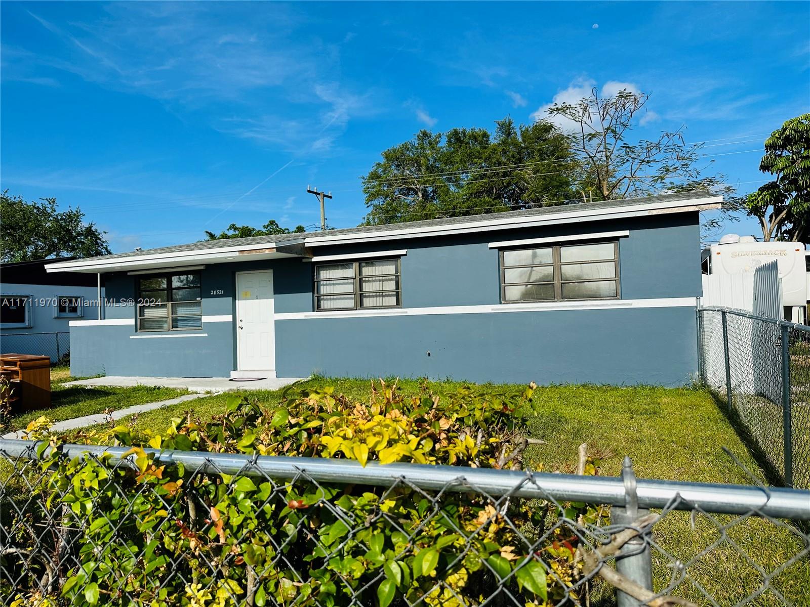 Beautiful single house with NEW roof,  with a large Lot, space to keep a boat, play game, nice lot to have activities or to park several cars. The house has 3 bedrooms and 1 full bathroom renovated, new washer/dryer, dishwasher, microwave, electric range, new refrigerator. No restrictions. No HOA, The laundry is inside and it is in an independent room. Nice view from the living room to the back patio.