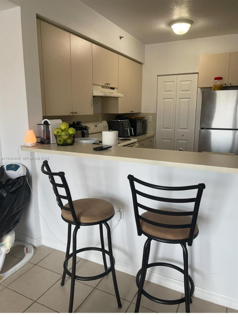 Great investment unit AVAILABLE. Tenants with lease ending February 2027. This one-bedroom apartment has great view with two balconies. Great location in a cul-de-sac. Few minutes from US-1, restaurants, shopping center. Washer, dryer. Two balconies with tile floors, playground, convenient mini market.  One assigned parking space and plenty of guest parking, management on site.