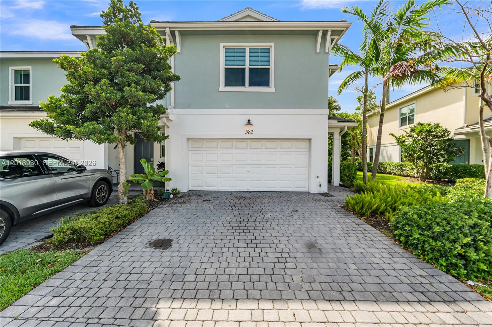 We are pleased to present this modern Toll Brothers townhome built in 2022. This two story, highly sought after corner unit, features three bedrooms / two and one-half bathrooms, a two car garage, high end kitchen with quartz counters, stainless steel appliances, luxurious marble/natural stone flooring, a private backyard with paved patio, top of the line finishes, additional large loft area upstairs, smart A/C system, electric blinds in most rooms and much more. Located in the wonderful gated community of Sandpiper Pointe with a beautiful community pool, gym, guest parking, maintained/landscaped areas in Deerfield Beach close to restaurants, shops, major highways, and the beach this is a unique opportunity to purchase a primary residence or investment property. Contact us today to schedule your private tour.