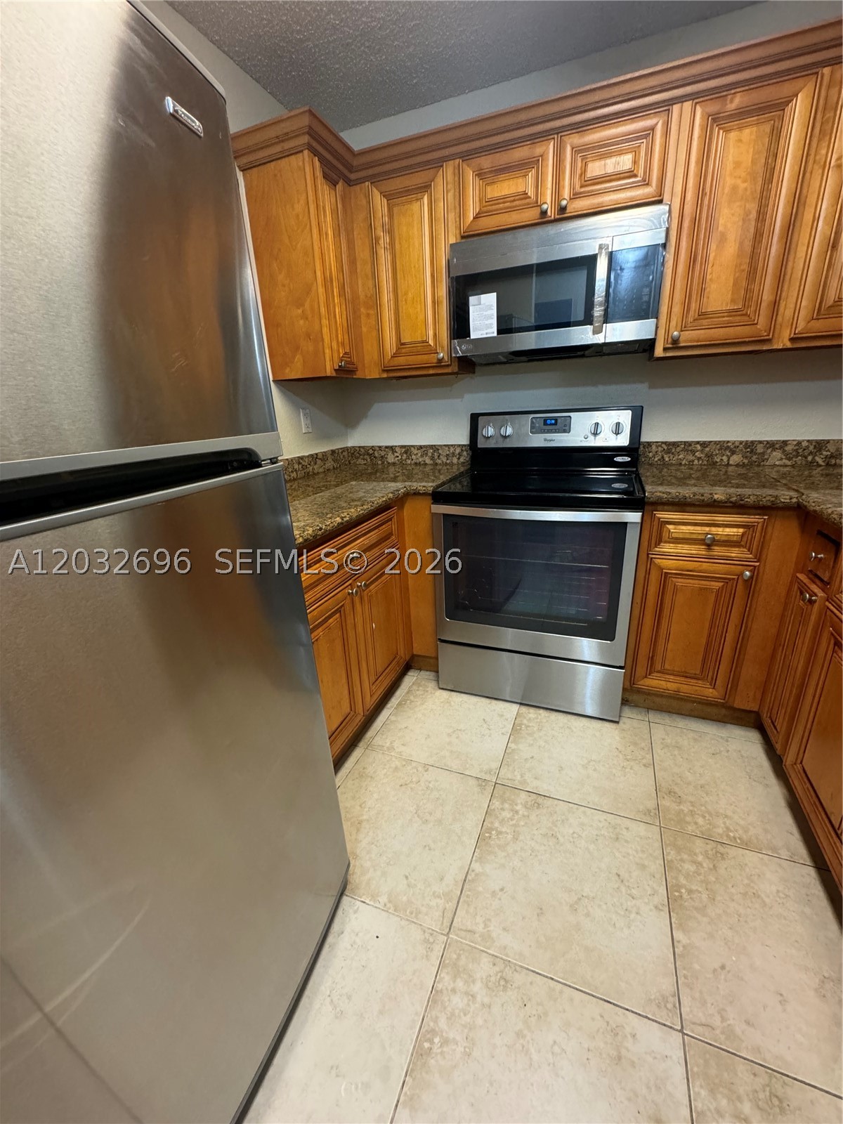 Amazing opportunity to own this beautifully maintained 2-bedroom, 2-bathroom condo at 1640 Windorah Way #D in West Palm Beach. This bright and inviting residence features a spacious open floor plan, abundant natural light, and comfortable living areas perfect for everyday living or seasonal enjoyment. The well-appointed kitchen offers ample cabinetry and workspace, while the primary suite includes a private bath and generous closet space. Enjoy relaxing on the screened patio overlooking peaceful surroundings. Conveniently located near shopping, dining, golf courses, major highways, beaches, and Palm Beach International Airport. Ideal as a primary residence, vacation home, or investment property. Don't miss this exceptional opportunity to enjoy the South Florida lifestyle!
