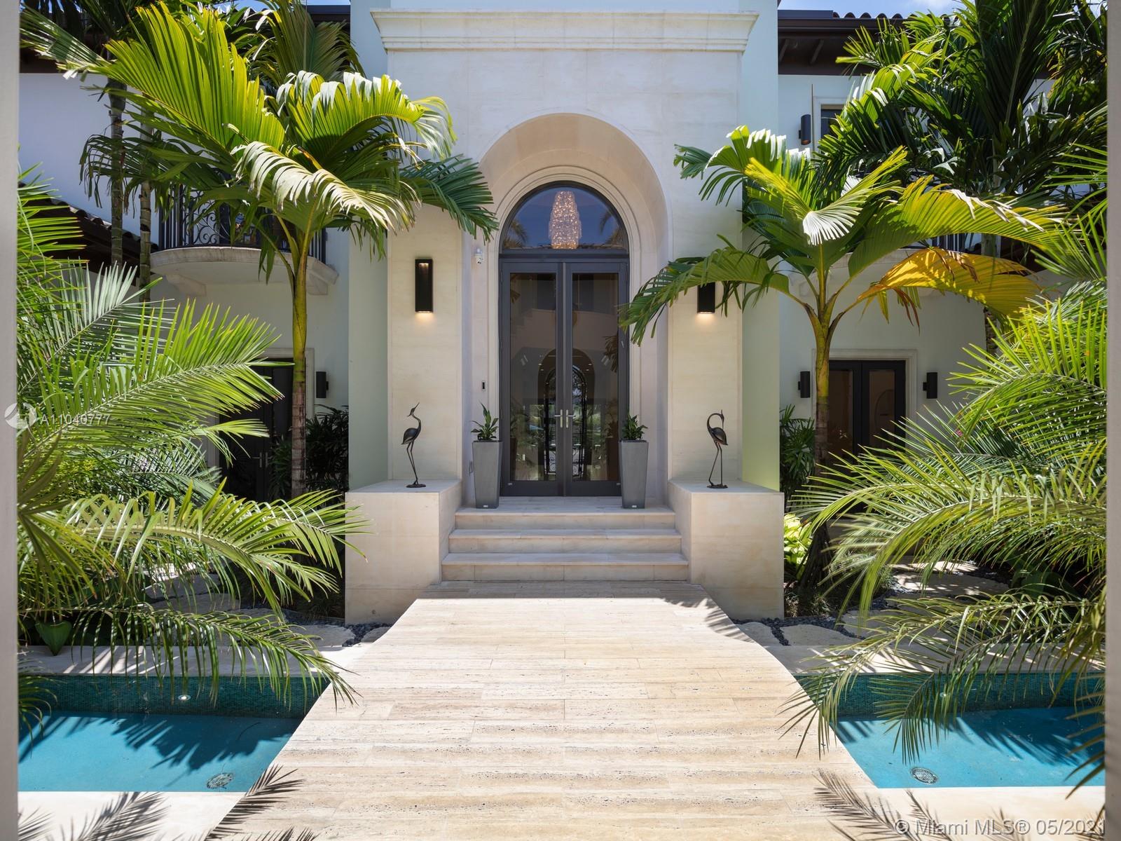 Located in the prestigious sought-after neighborhood of N. PINECREST this 6 Bed/8.5 BA “Transitional” 4-year new home on a 1.12 professionally landscaped acre boasts verdant views of the gardens w/ Majestic King Palms that grace the resort style dual swim-out heated saline pool w/ adjacent outdoor shower. Featuring a plethora of top-of-the-line features & finishes this Smart Home offers the Elan Home system which puts command of your house at your fingertips, the Jandy Pool/Spa automation system, organic mosquito repellent system, media room, playroom, gym, two offices, a guest suite w/liv. rm & private entrance, staff quarters, 500+ bottle wine cellar & butler’s pantry.  A true spacious chef’s kitchen w/WOLF, Miele, stainless steel & glass Sub Zero refrigerator & 6 burner WOLF gas stove.