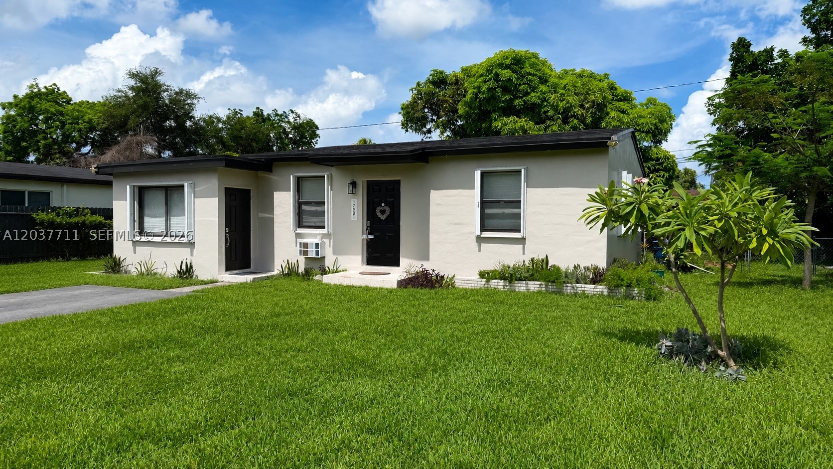 Well-maintained, move-in-ready home with no HOA offering 1,344 square feet of comfortable living space. Recent updates include a new roof installed in 2022, accordion hurricane shutters, and freshly painted interior and exterior. The bright and functional layout is filled with natural light and designed for comfortable everyday living. The kitchen features granite countertops and stainless steel appliances. Enjoy South Florida living in the spacious backyard, complete with mature mango, avocado, and ackee trees that provide shade, privacy, and fresh seasonal fruit. With plenty of room for outdoor entertaining, gardening, or future enhancements, the outdoor space offers endless possibilities. Ideally situated with convenient access to major roadways, shopping, dining, schools, parks, and recreational amenities. Don't miss this opportunity to own a move-in-ready home that combines valuable updates, tropical charm, and the freedom of no HOA.