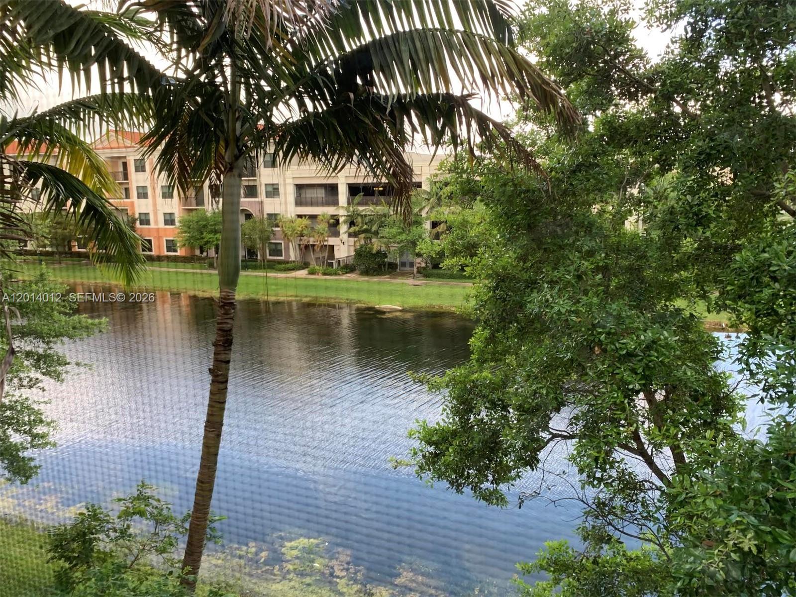 Water view,Luxury living in this spacious 3 bedroom 2.5 baths,open floor plan,fully upgrated granite counter tops.This residence offers open layout with impact windows ,natural gas. Resort style community ,including a stunning clubhouse, three heated pools, a full fitness center,sauna,indoor basketball court,tennis&pickball courts, billiards, party rooms,and a children's water park. right across the street from Sawgrass Mills and restaurants and BB&T Center.