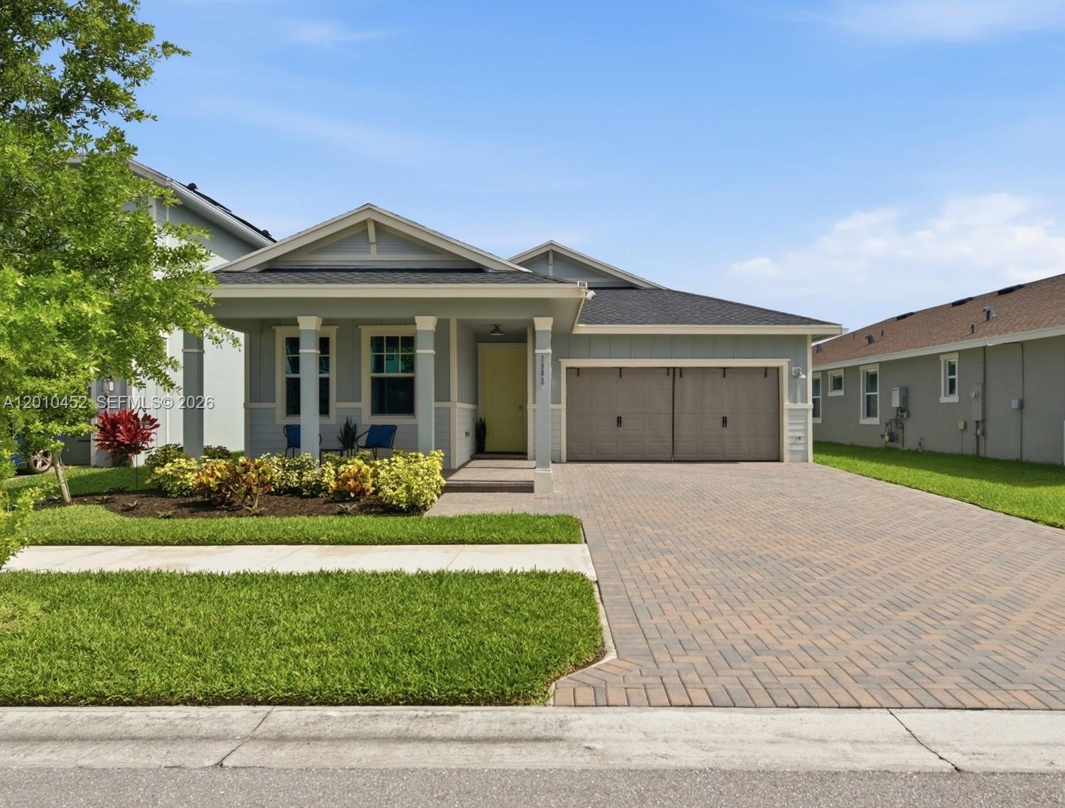Built in 2023 and located in the highly desirable, gated (24hr) Arden community, a true 3-bedroom, 2 bathroom home has been meticulously maintained and shows like a model. The open-concept floor plan features tile flooring throughout and a spacious family and dining area combination, ideal for both everyday living and entertaining. The modern kitchen includes a large center island, quartz countertops, gas range, tile backsplash, and stainless-steel appliances. Additional highlights include a 2-car garage, Ring doorbell, ceiling fans in every room, and a screened-in patio overlooking a fully fenced backyard with added pavers and lush Clusia landscaping for enhanced privacy. Arden is an award-winning, family-oriented 1,200-acre master-planned community offering a true farm-to-table lifestyle. Residents enjoy over 20 miles of scenic walking and biking trails, serene lakes, 5-acre community farm and garden featuring seasonal harvests, events, and fresh produce. Resort-style amenities include a zero-entry pool, playgrounds, and a 3,000-square-foot state-of-the-art fitness center. Recreation options abound with pickleball and tennis courts, basketball and volleyball courts, soccer fields, and a boat launch for kayaking and paddleboarding, creating an active and welcoming environment for all ages. Saddle View Elementary School is within walking distance, Seller to sponsor 2/1 temporary interest rate buydown for qualified buyer with qualified offer.