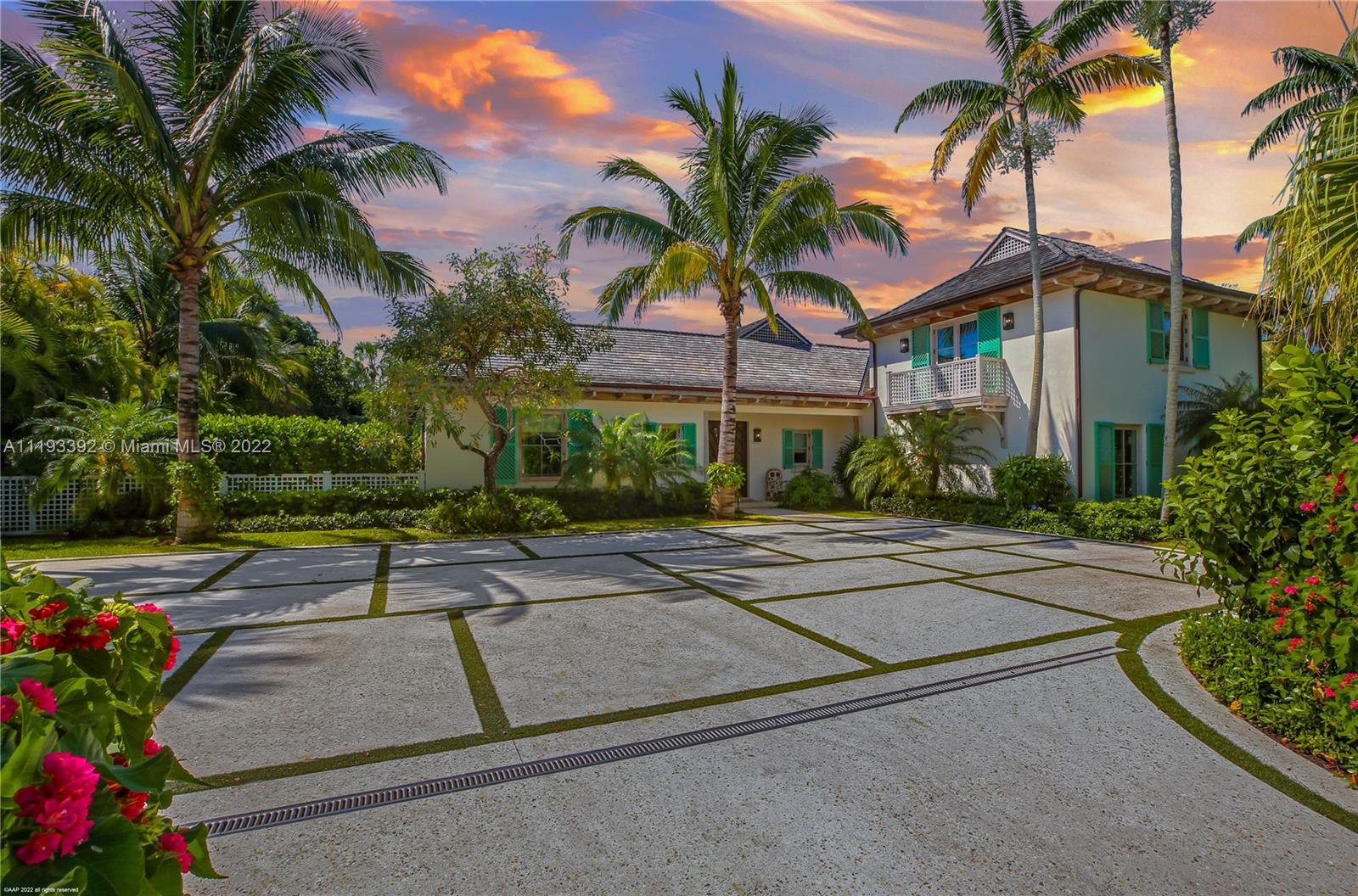 An eclectic, newly renovated family home rebuilt in the tradition of Florida architecture with an appreciation of Caribbean style is available for purchase in the exclusive Jupiter Island community. This perfect retreat, curated by Lori Deeds of Kemble Interiors, provides a marvelous array of colors and textures from Morocco, the Dominican Republic, India, and the African continent, yielding unexpected design elements with surprising communal harmony. The solid aluminum front doors open to an entryway with soaring cypress ceilings and customed-dyed tile flooring imported from India. As you enter the great room, your eyes are drawn upward to the stunning four copper chandeliers.