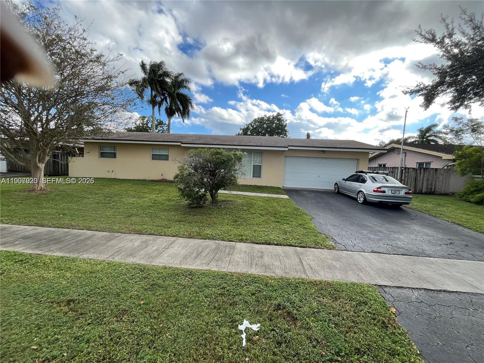 Beautiful 3 bedrooms 2 bathrooms home in Mirror Lakes Plantation. This home features an updated kitchen with an island, impact windows, updated master bath and a newer roof that is less than five years.