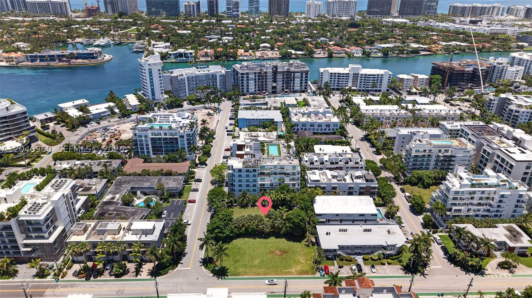 Rare development opportunity in the heart of Bay Harbor Islands — one of Miami's most sought-after and rapidly appreciating neighborhoods. This 11,250 SF corner lot (75 × 150 ft) is zoned RM-2 and offers up to 22,000 SF of buildable area, per architectural feasibility study. Ideally suited for a boutique condominium project.
Centrally located on W Bay Harbor Drive, steps from Bal Harbour Shops, the beach, and top-rated Ruth K. Broad Bay Harbor K-8 Center. Surrounded by new luxury developments including Alana, One Bay Harbor, Le Jardin, and the iconic Kane Concourse corridor. All utilities available at the street (water, sewer, electric, gas). 
Priced at land value. This is the last remaining vacant lot of this size on W Bay Harbor Drive — an irreplaceable opportunity for a developer or investor looking to build premium product.