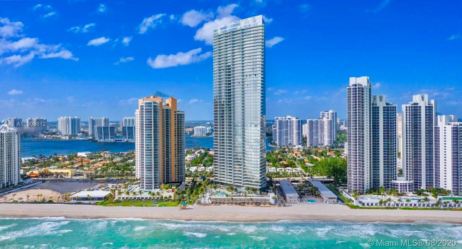 This magnificent tastefully finished flow through unit has breathtaking Ocean, City & Intracoastal Views. Unit features a private elevator that takes you to your 4 BDRM 5.5 BTH + Den With 3176 sq ft. Two Oversized terraces with a Summer Kitchen on the ocean side. Italian designed kitchen with sleek edges, imported stone countertops & backsplashes. Sub-Zero & Wolf appliances, 36x48 Gray Dove Marble  throughout custom closets & electric blinds. Master Bathroom features Italian stone throughout with a spa shower. Armani has designed the building with flawless curves and state of the art theatre, game room, and gym. Experience the true pleasures at the spa, salon, restaurant, and lounge. 24 hr Security and Full beach service. Relax at the oceanside pool and bar.